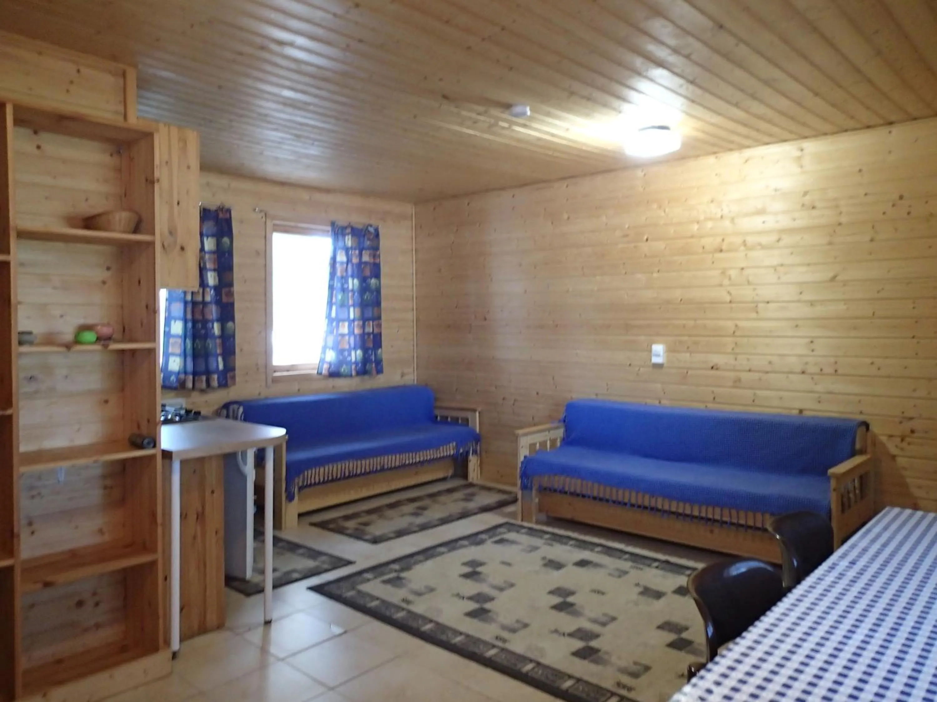 Decorative detail, Bed in Lomasaaret Cottages