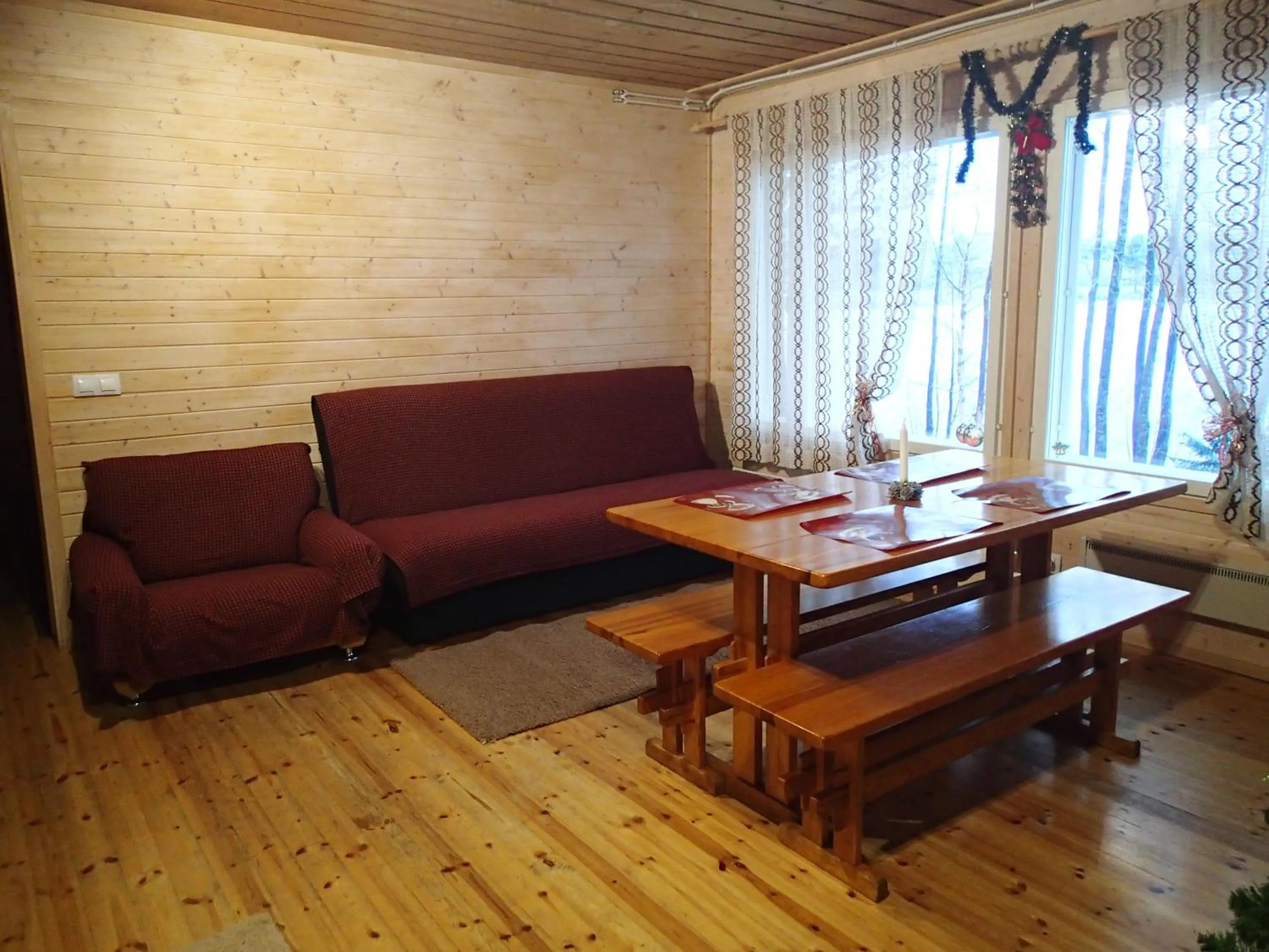 Seating area in Lomasaaret Cottages