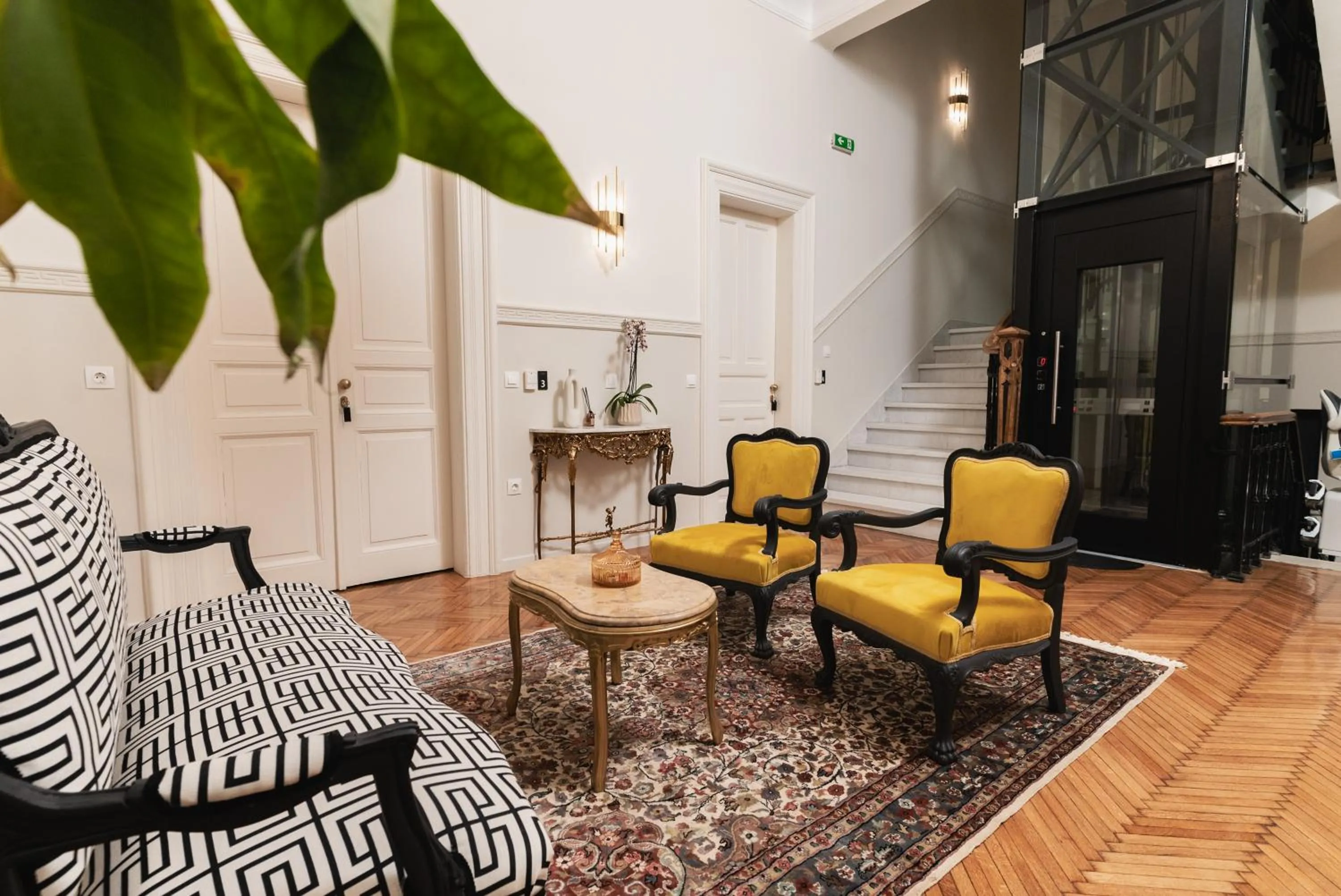 Communal lounge/ TV room in Villa Clio, a Luxury Collection