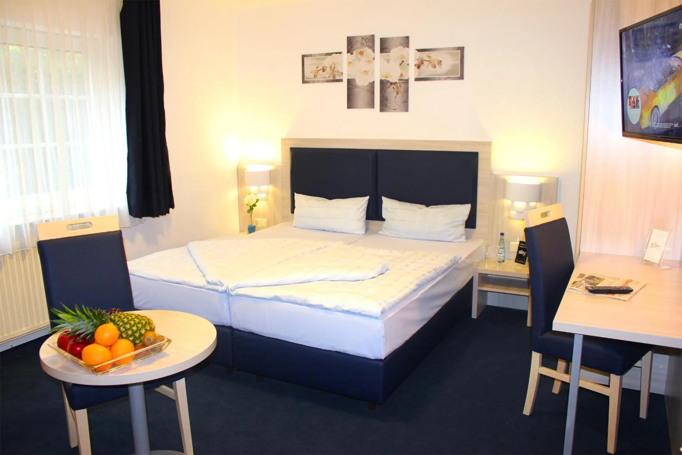 Bed in Hotel Altenwerder Hof