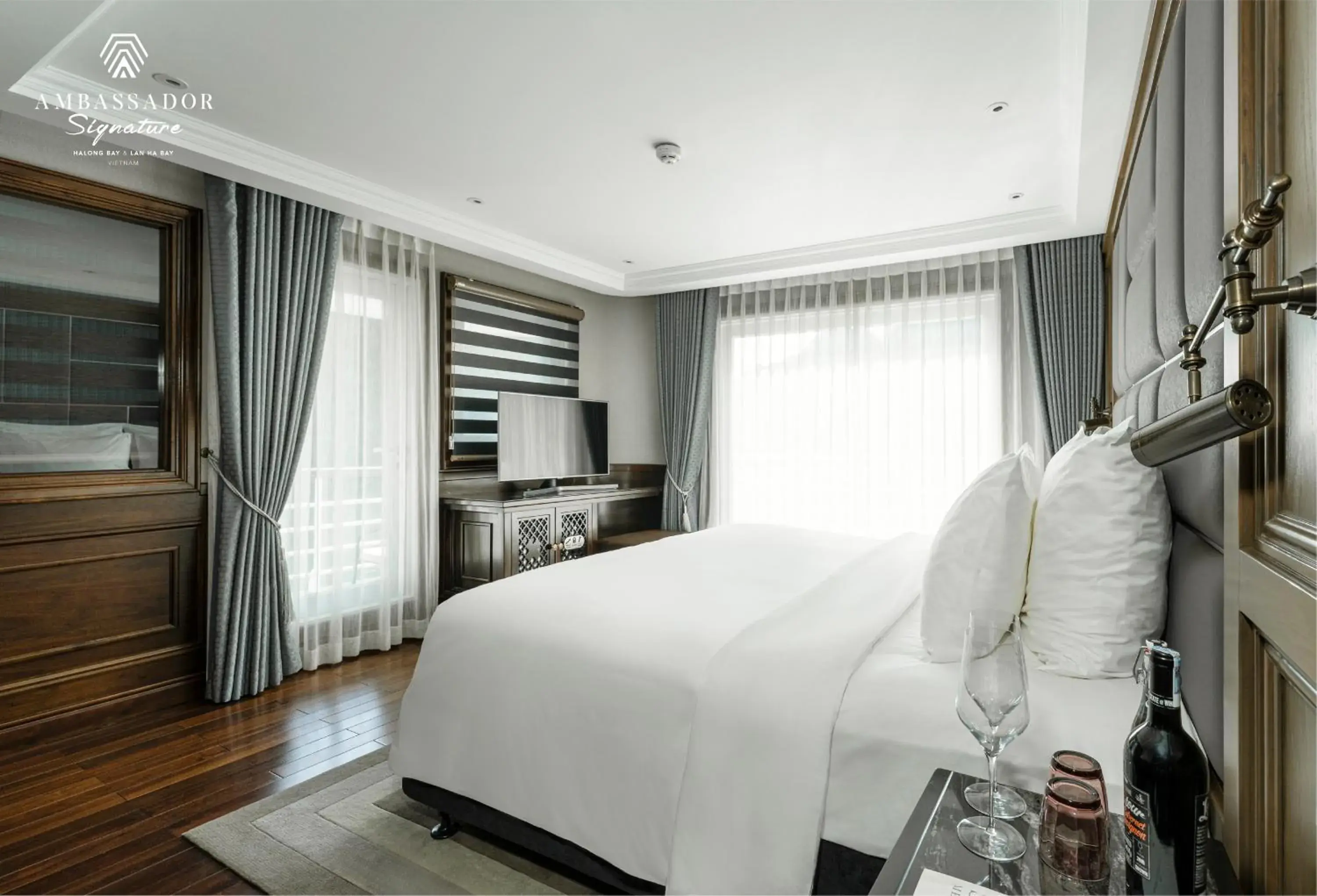 Ambassador Suite Balcony - single occupancy in Ambassador Signature Cruise - Lan Ha Bay Ambassador Suite Balcony - single occupancy in Ambassador Signature Cruise - Lan Ha Bay