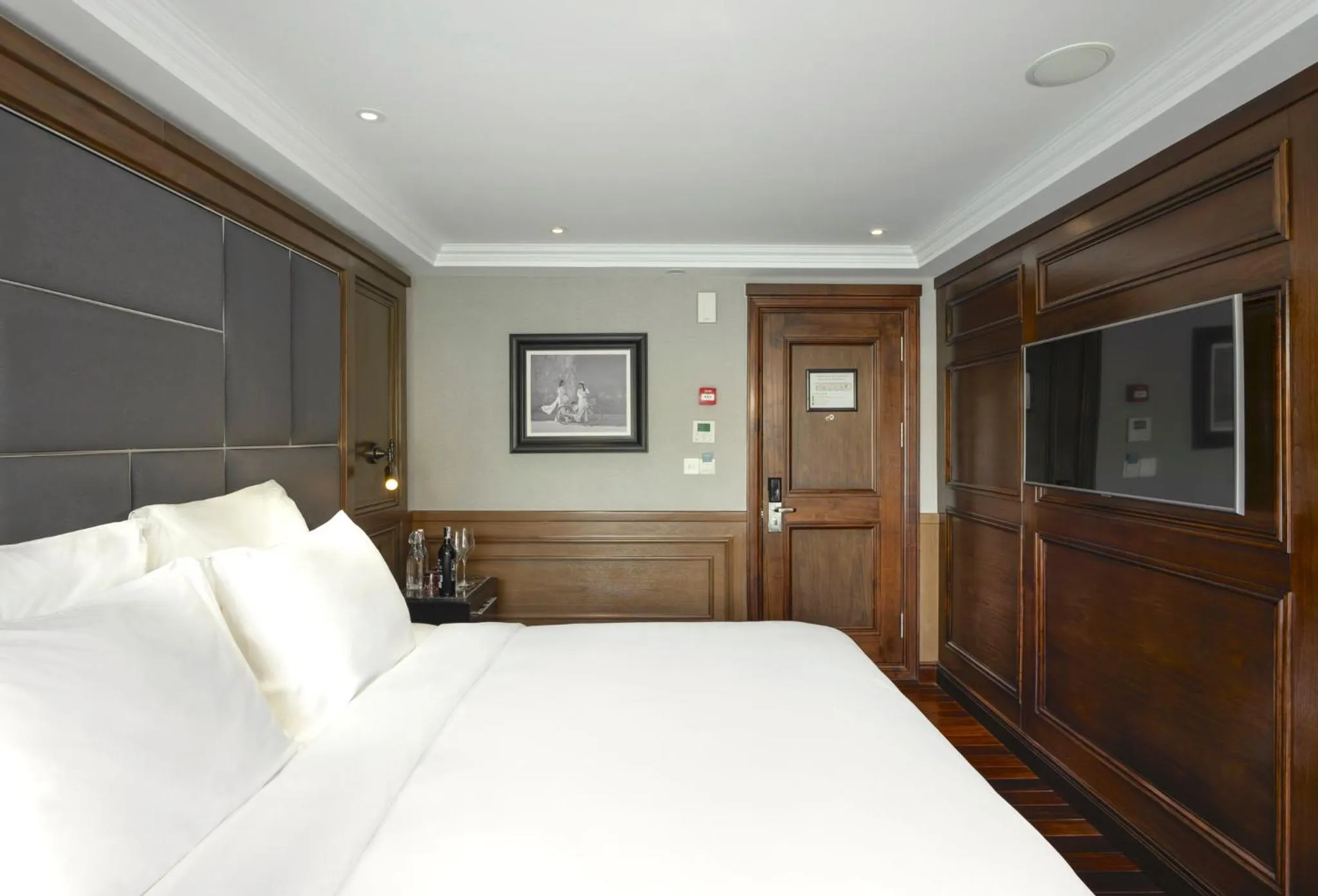 Photo of the whole room, Bed in Ambassador Signature Cruise - Lan Ha Bay