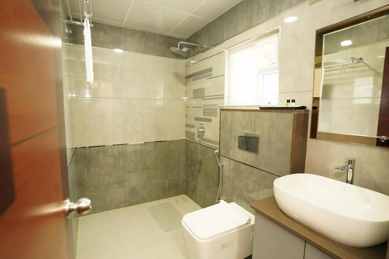Bathroom in Saavees Residency