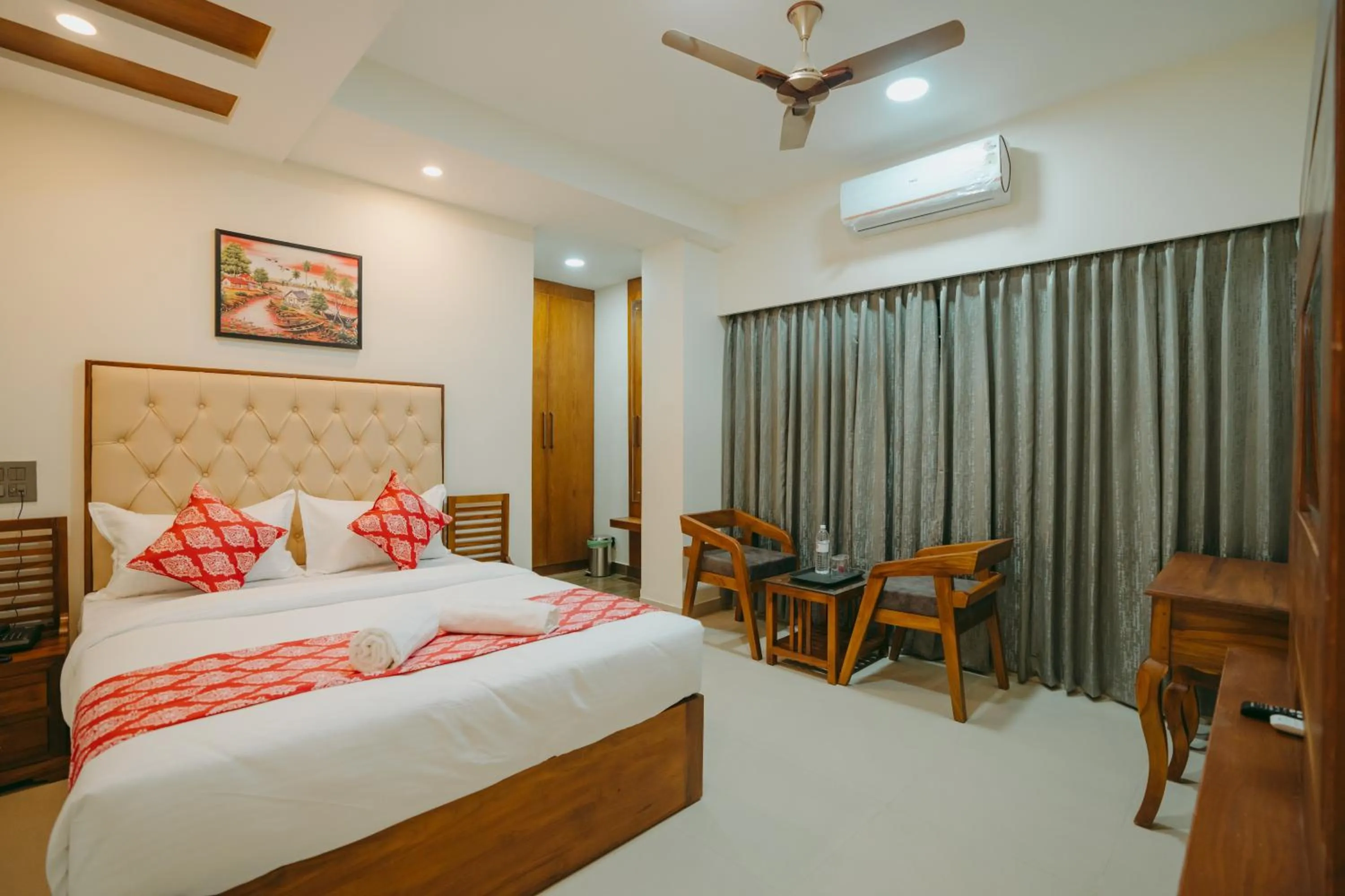 Photo of the whole room, Bed in Saavees Residency