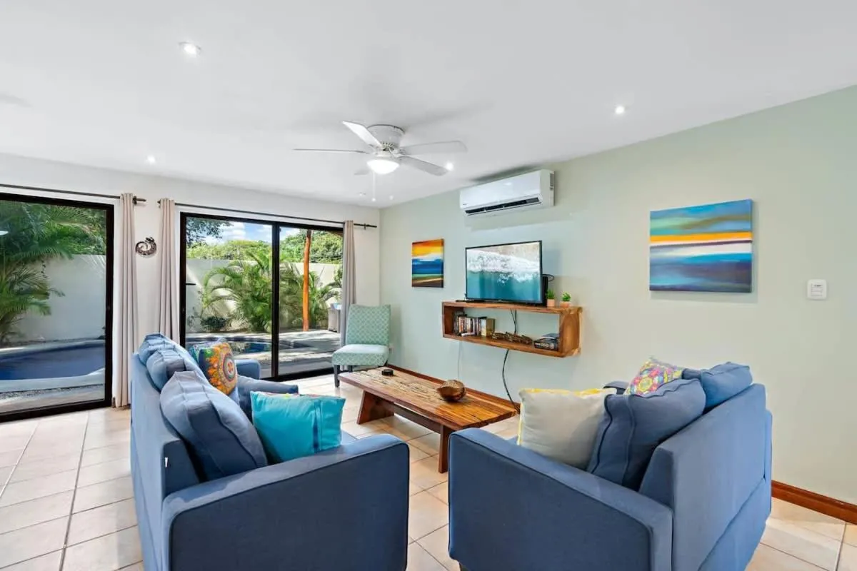 Inviting Home with Colorful Decor and Private Backyard Oasis with a Swimming Pool & Shaded Terrace