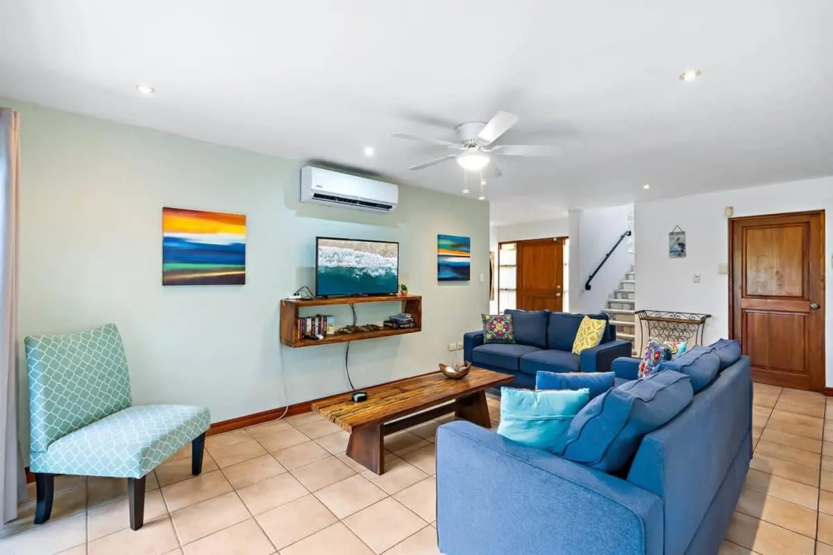 Inviting Home with Colorful Decor and Private Backyard Oasis with a Swimming Pool & Shaded Terrace