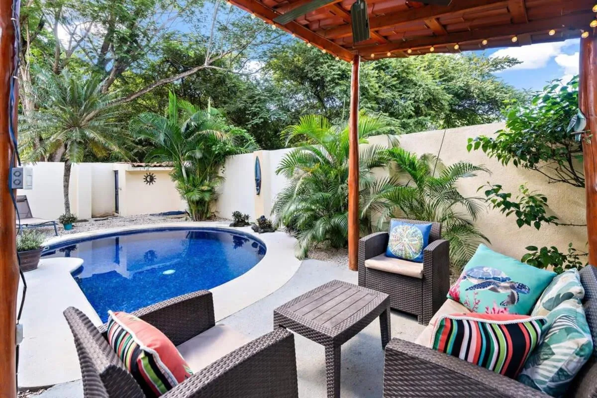 Inviting Home with Colorful Decor and Private Backyard Oasis with a Swimming Pool & Shaded Terrace