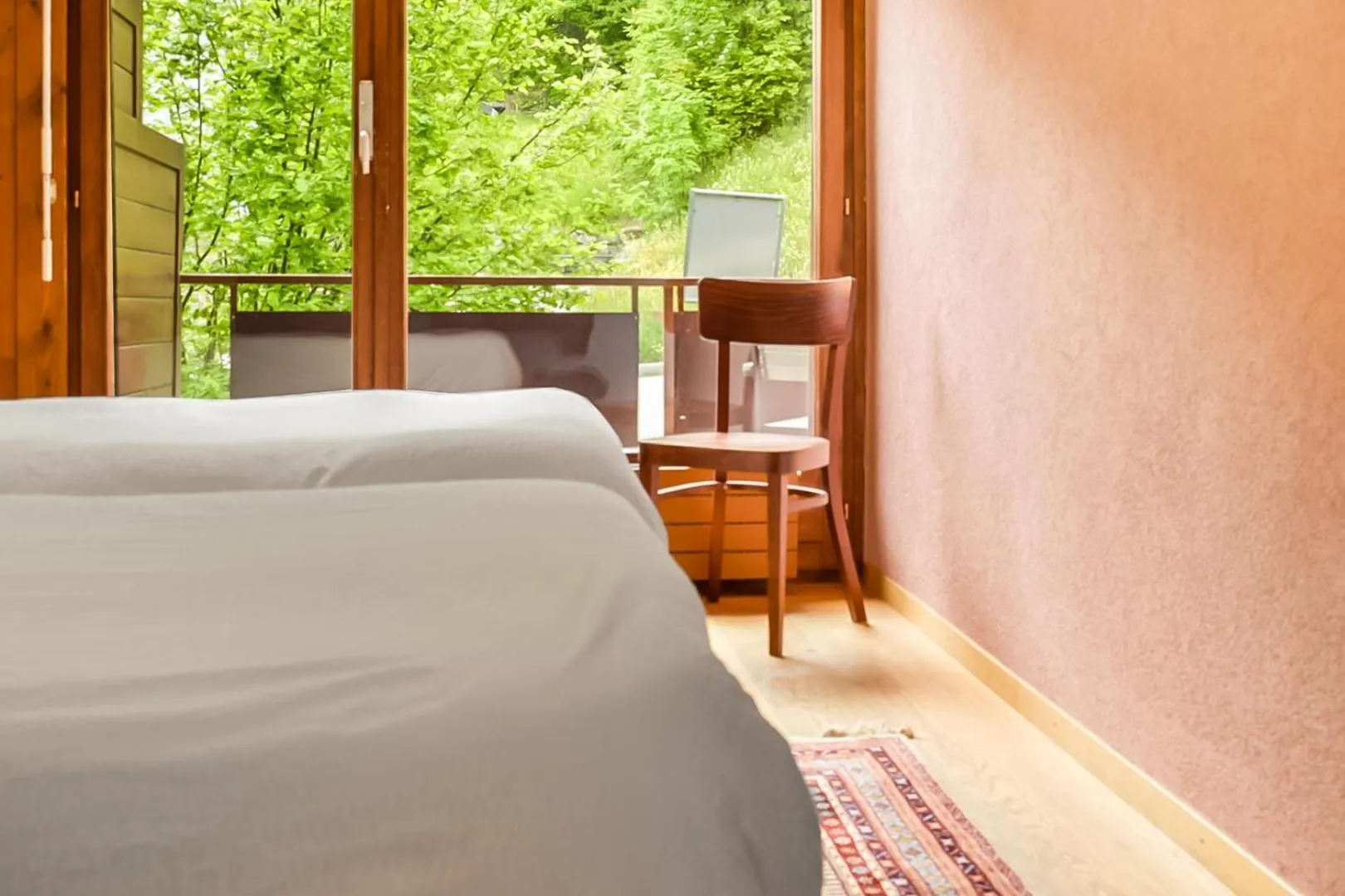 Bed in Between Boutique Hotel