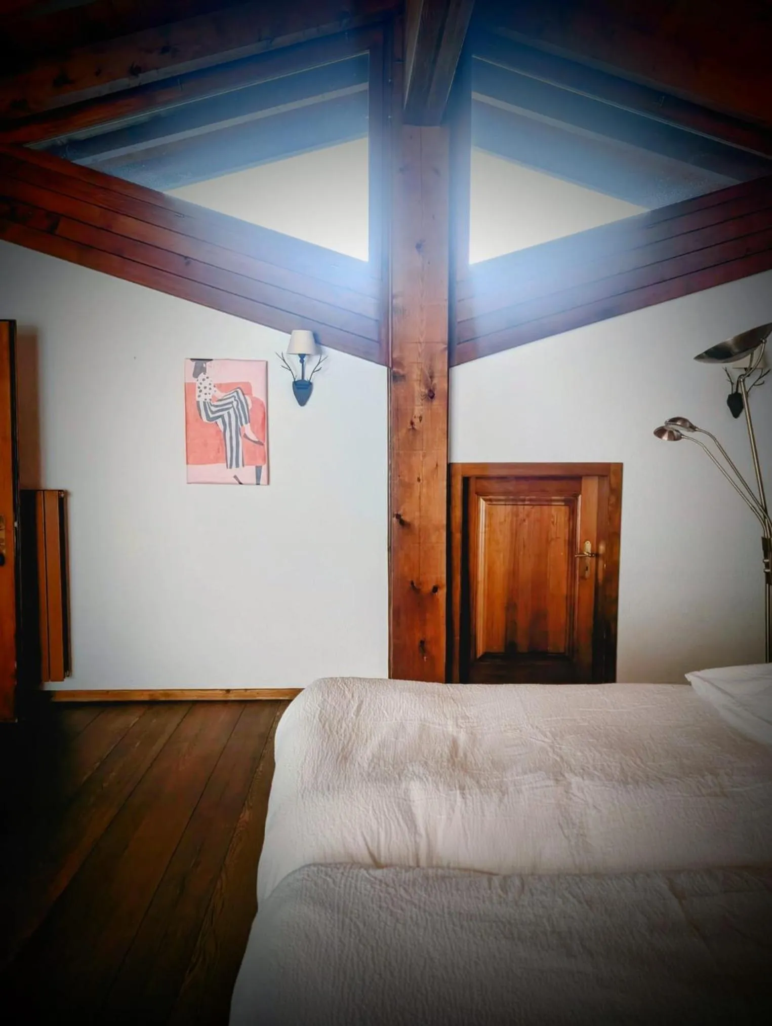 Bed in Between Boutique Hotel