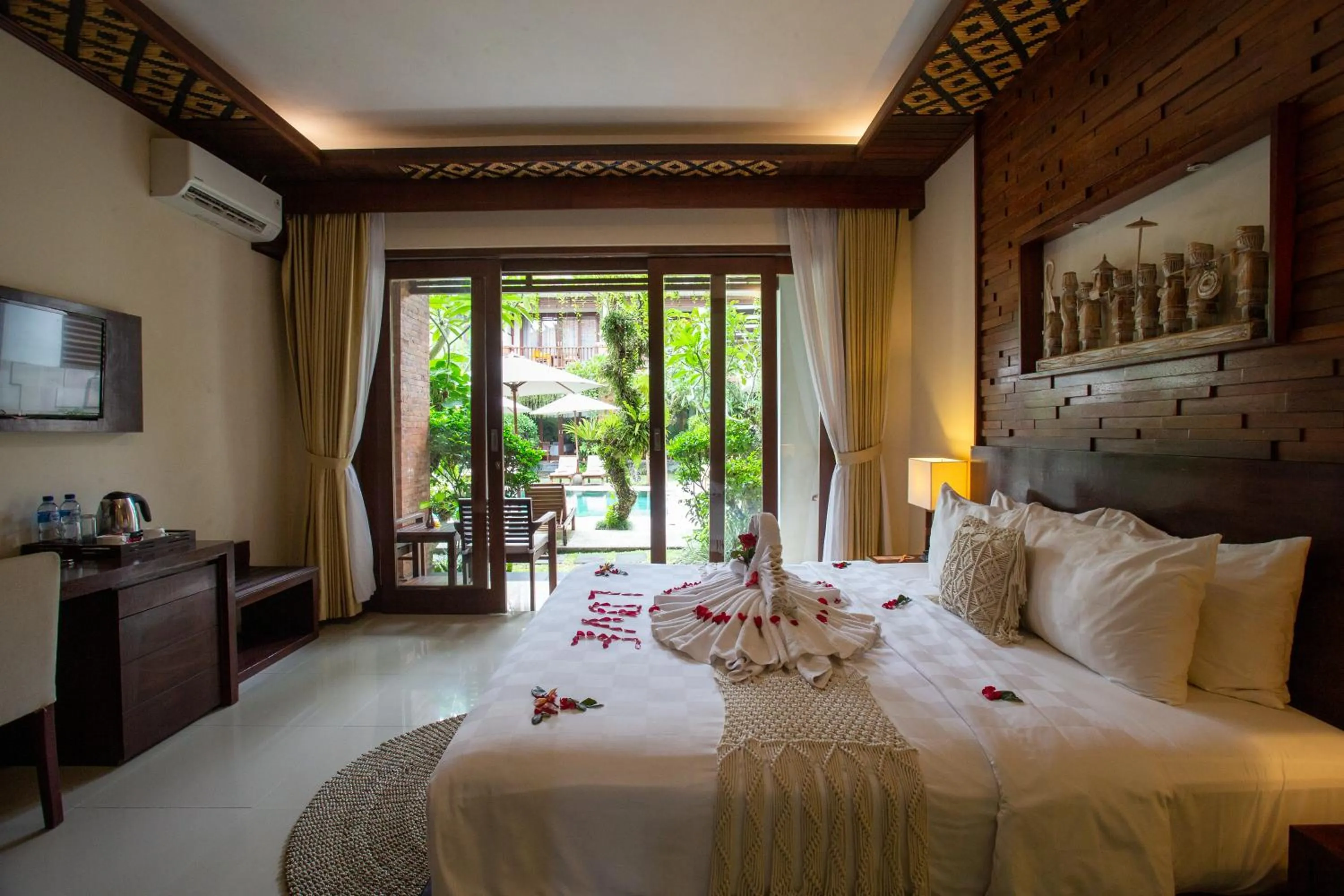 Bed in Awatara Boutique Resort Ubud