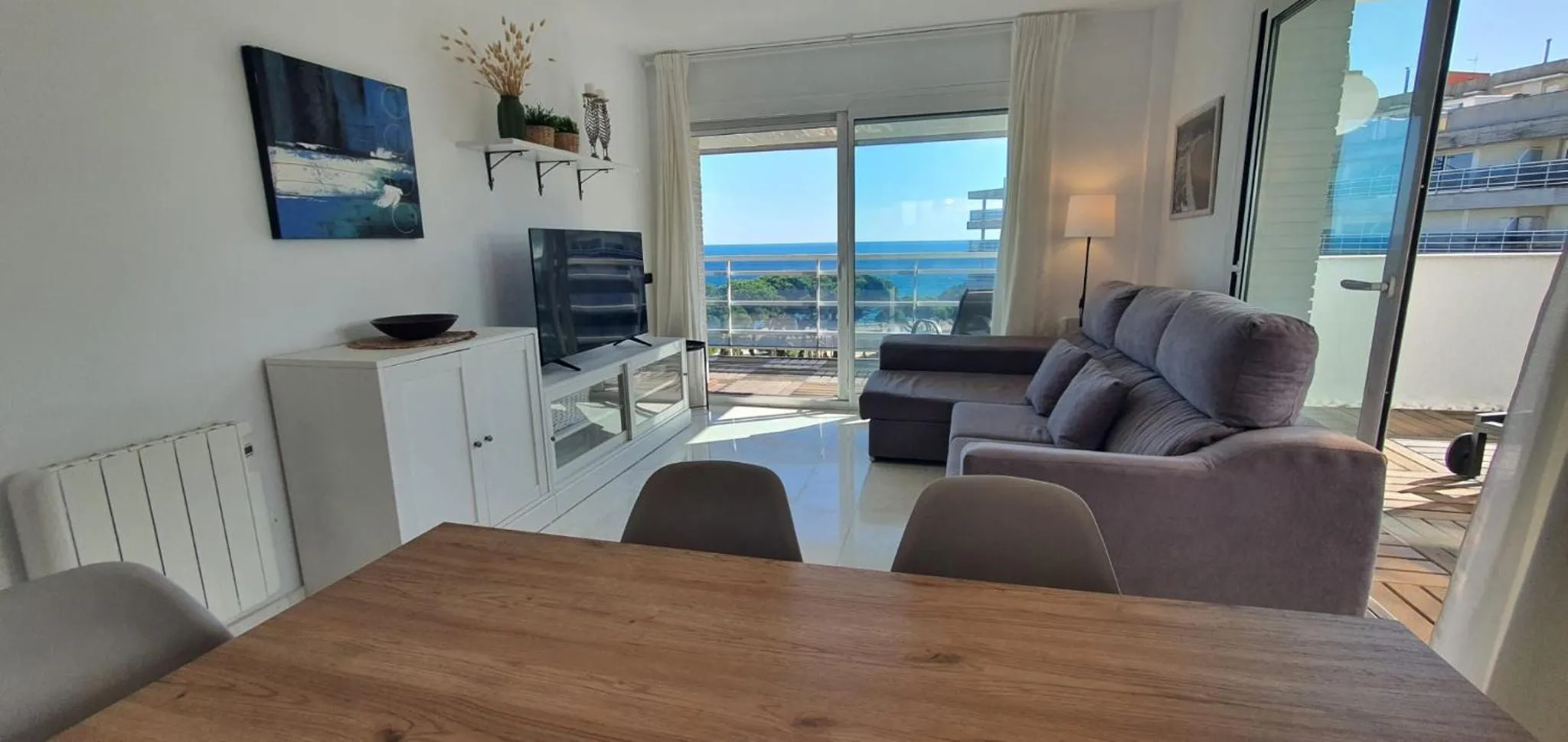 Ático con gran terraza y vistas al mar