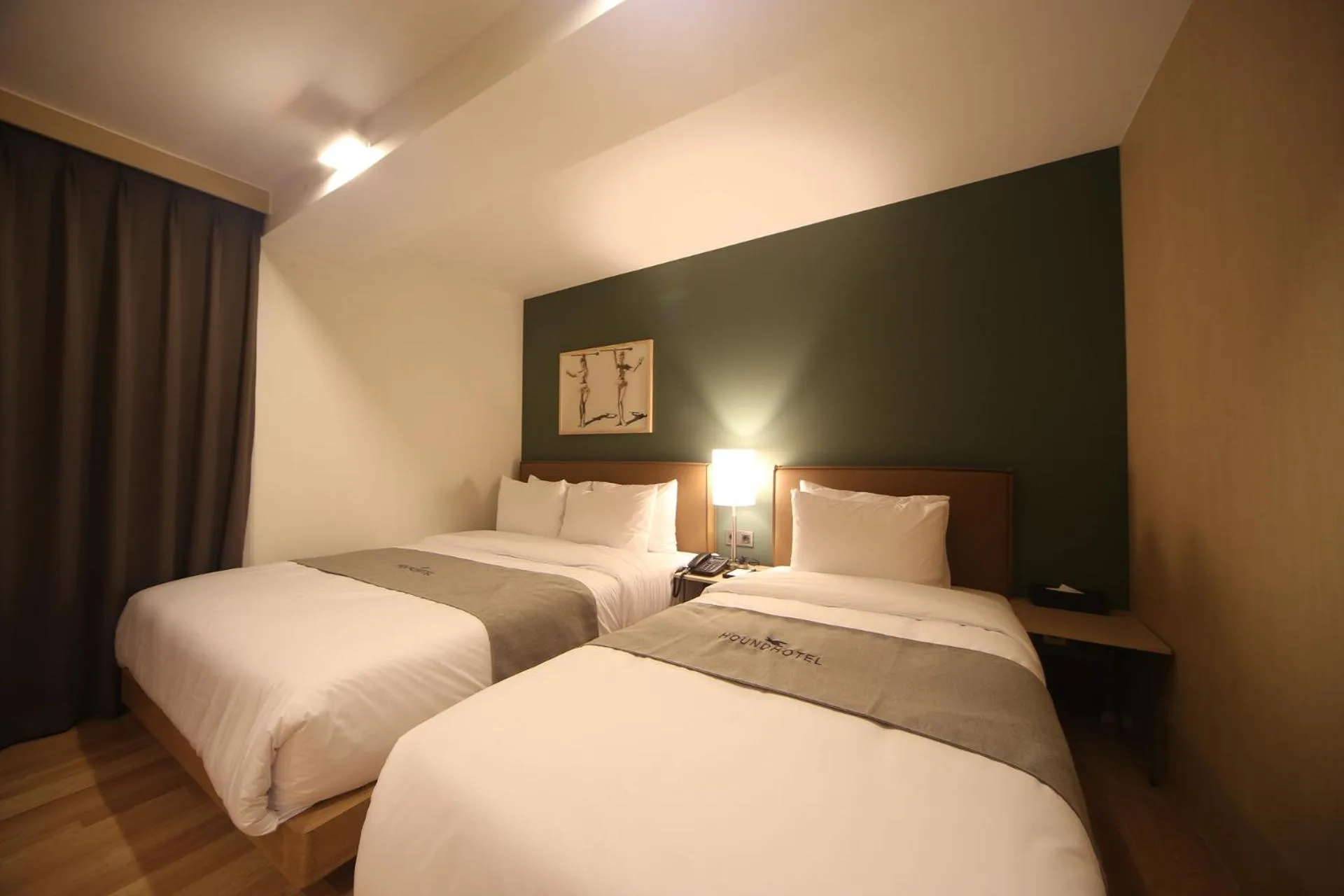 Bed in Dongnae Hound Hotel Sajik Minam Station