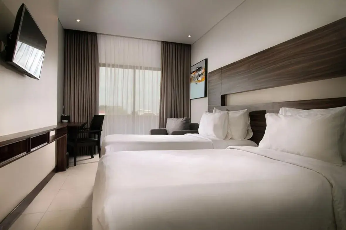 Bed in HELIOS HOTEL & CONVENTION Bed in HELIOS HOTEL & CONVENTION