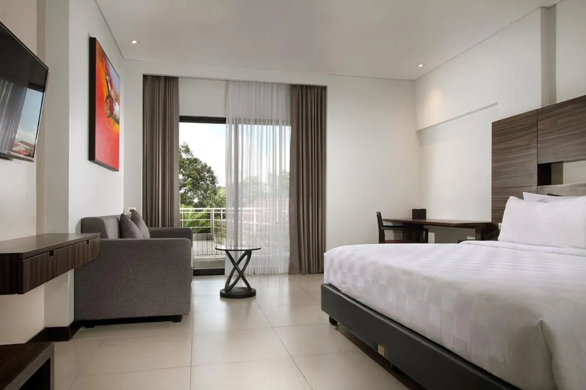 Bed in HELIOS HOTEL & CONVENTION