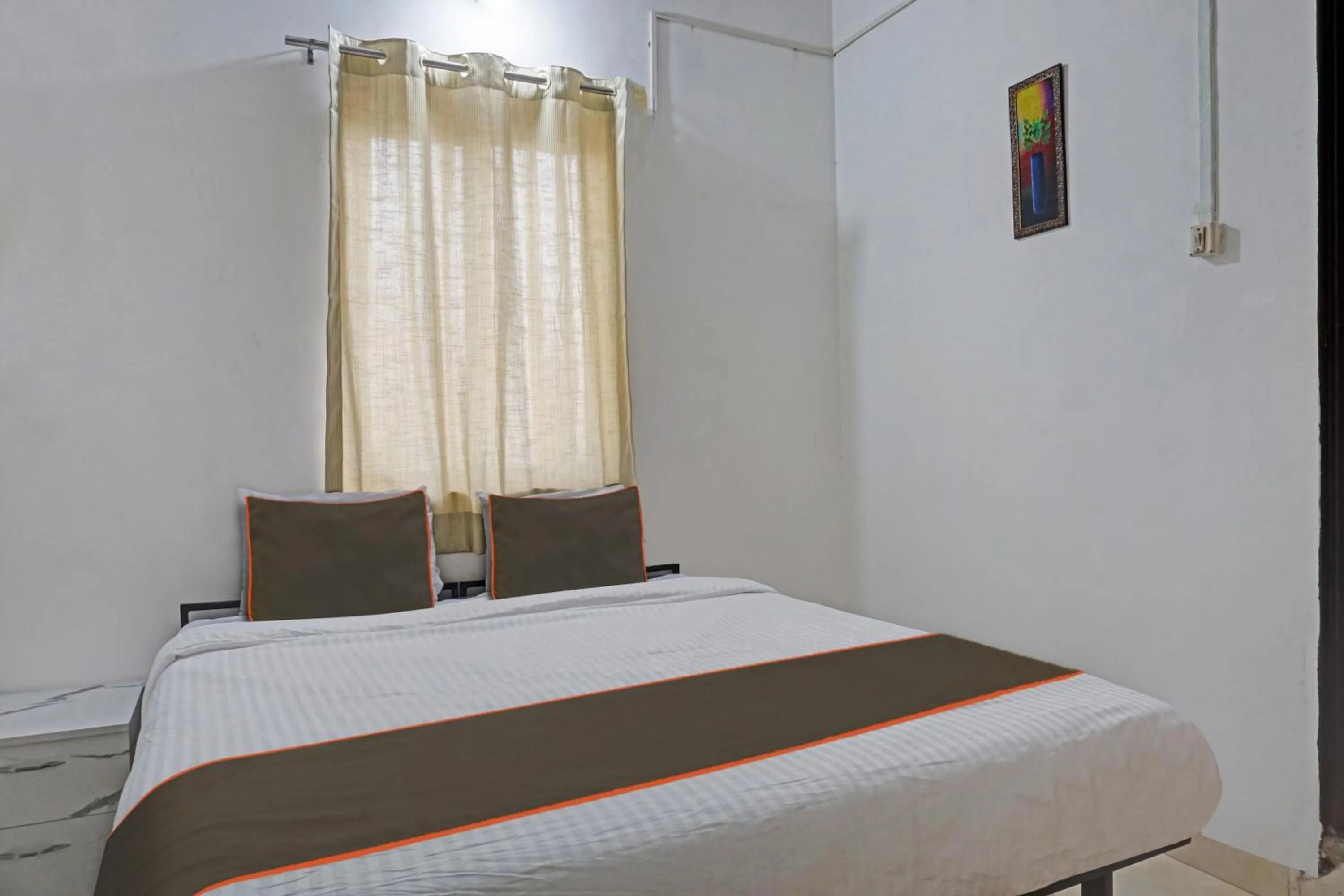 Bedroom in Hotel O Delight Stay Inn