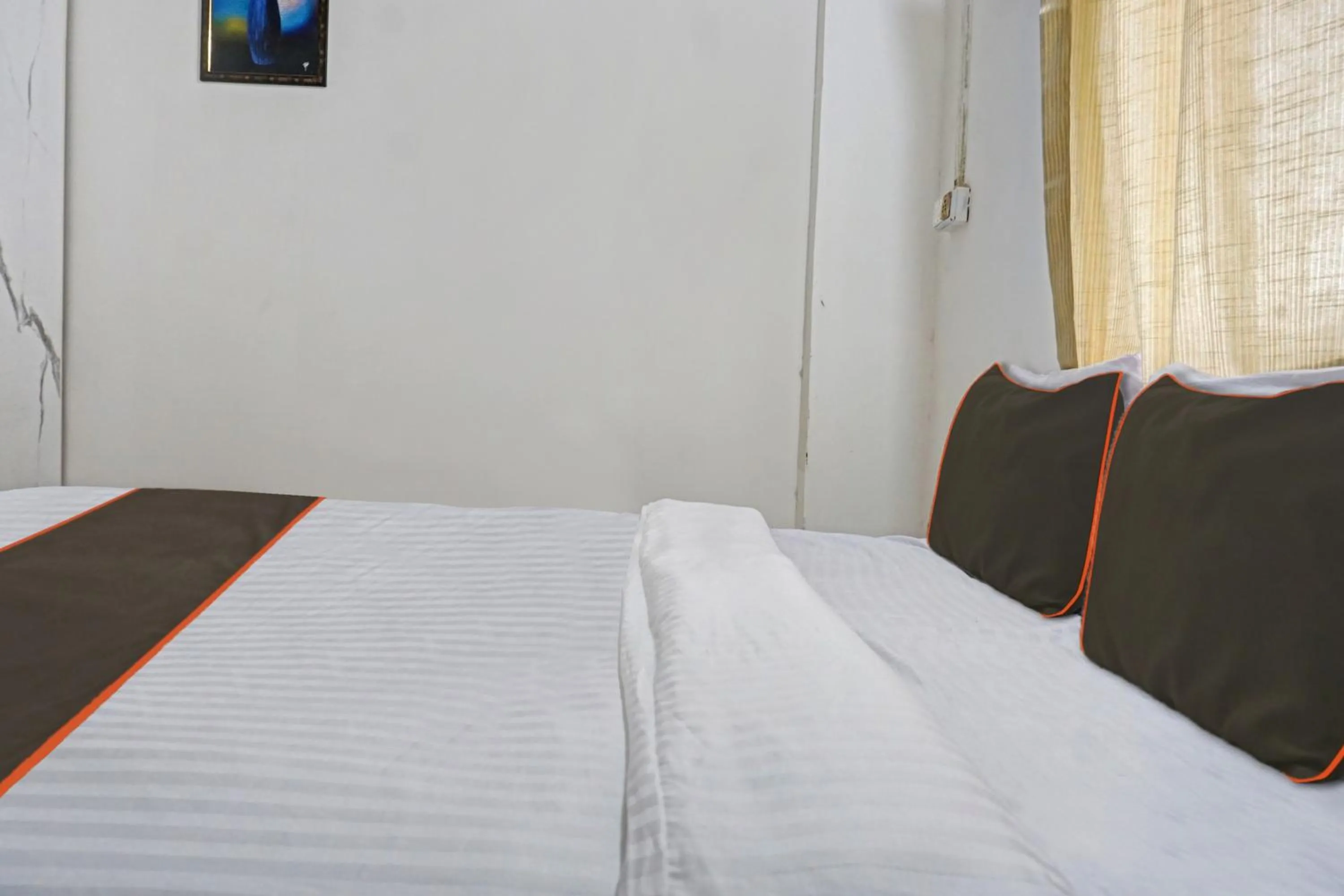Bedroom in Hotel O Delight Stay Inn