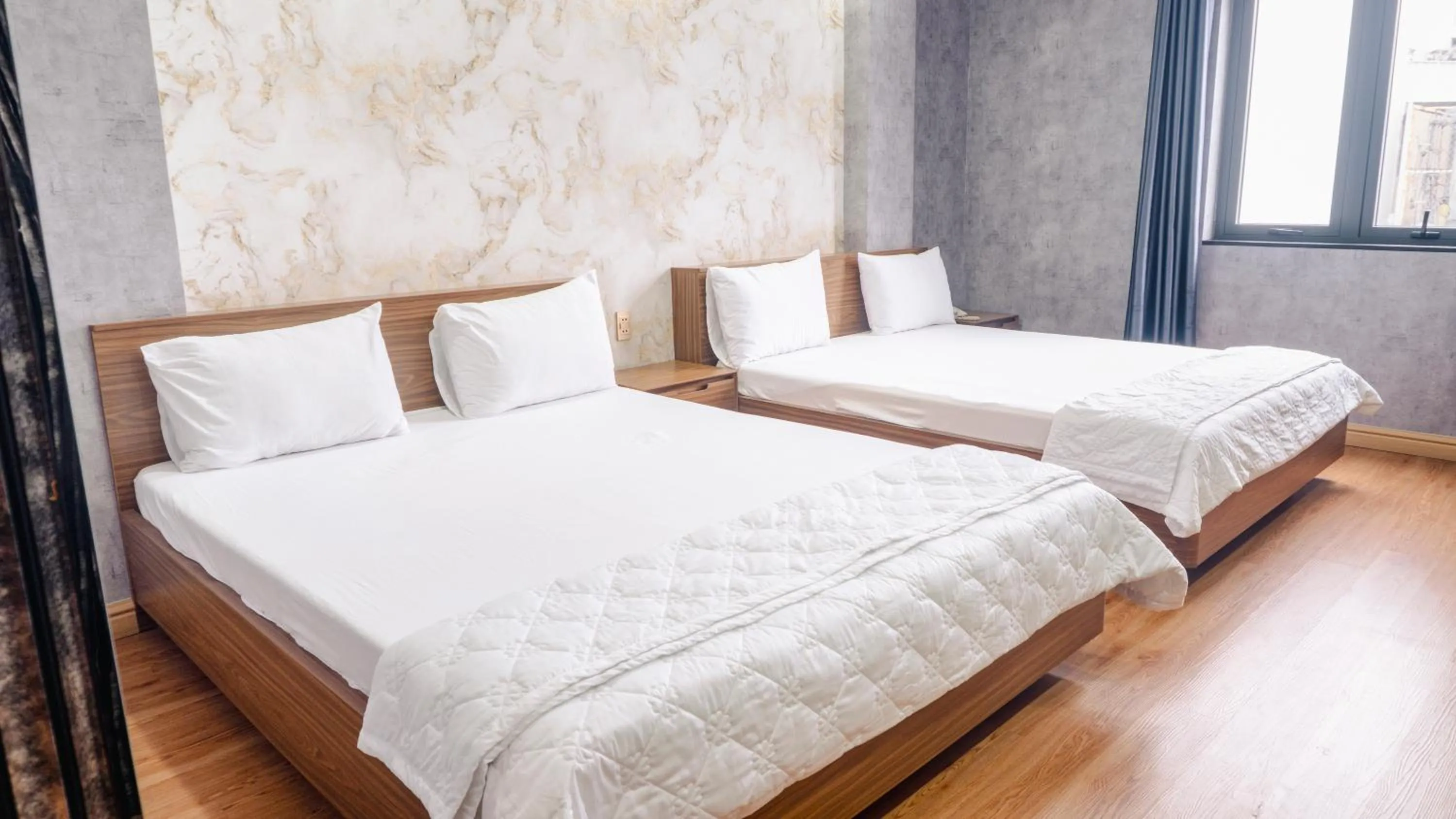 Bed in Thanh Binh Premium Hotel