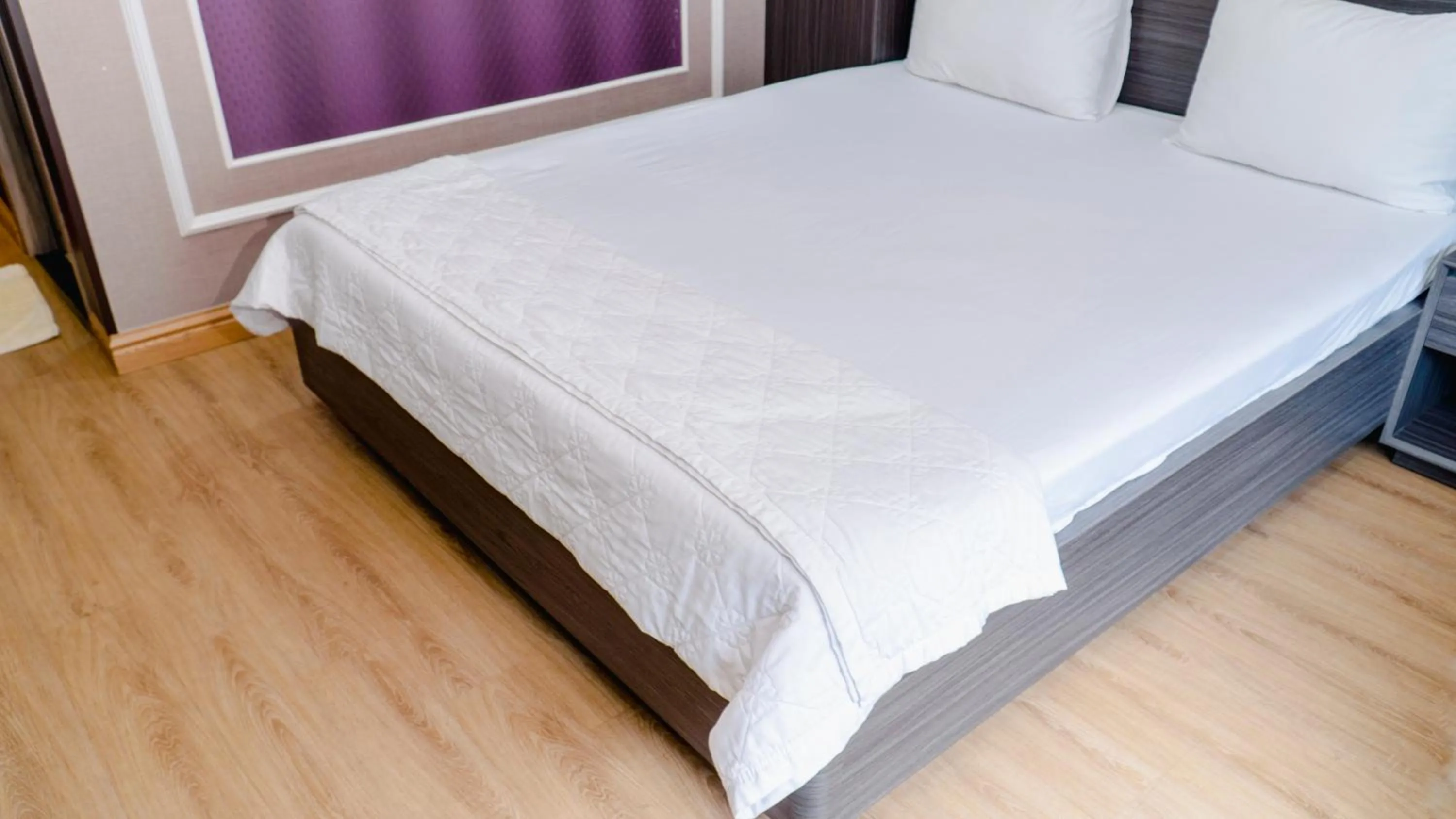 Bed in Thanh Binh Premium Hotel