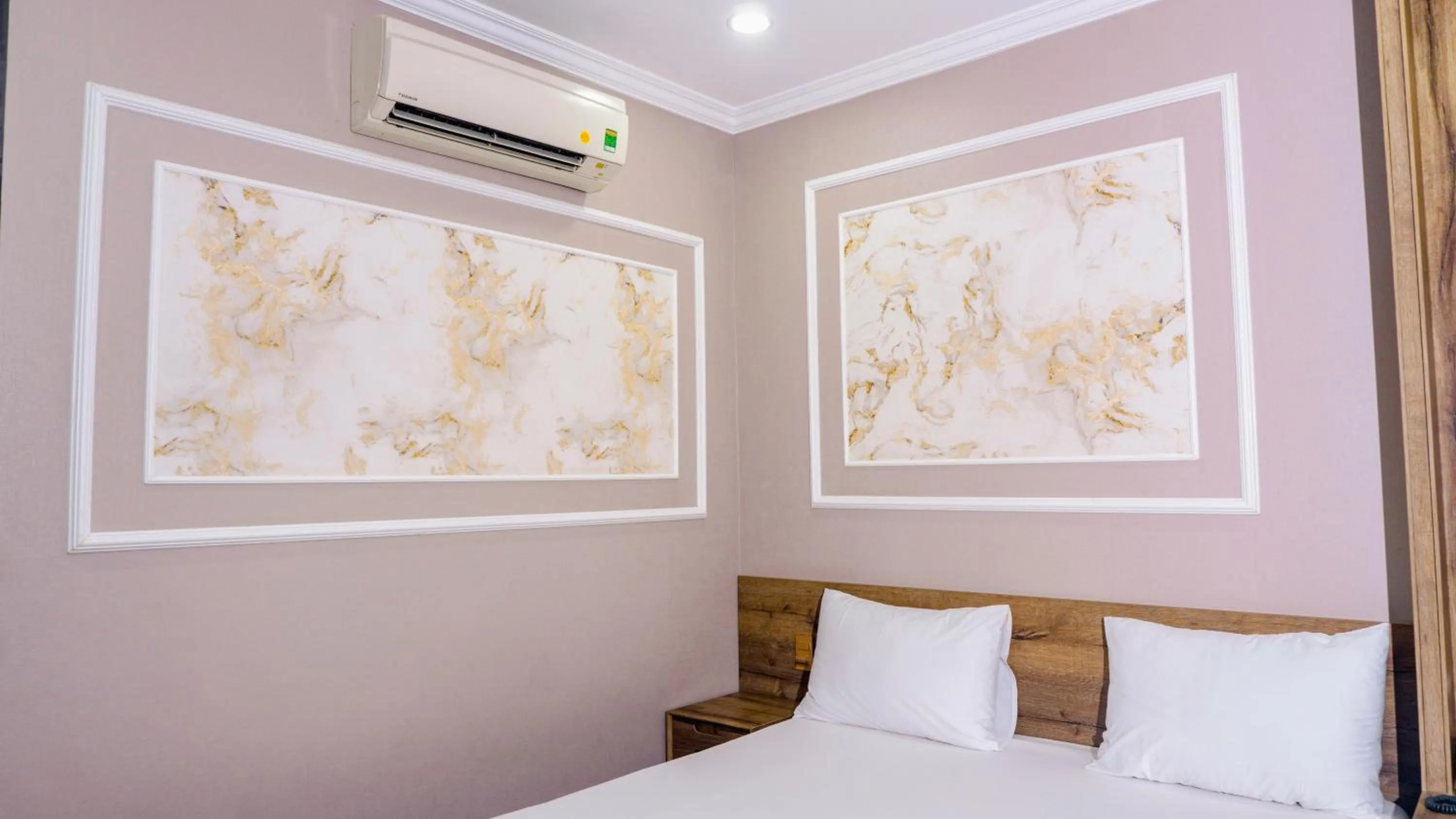 Bed in Thanh Binh Premium Hotel