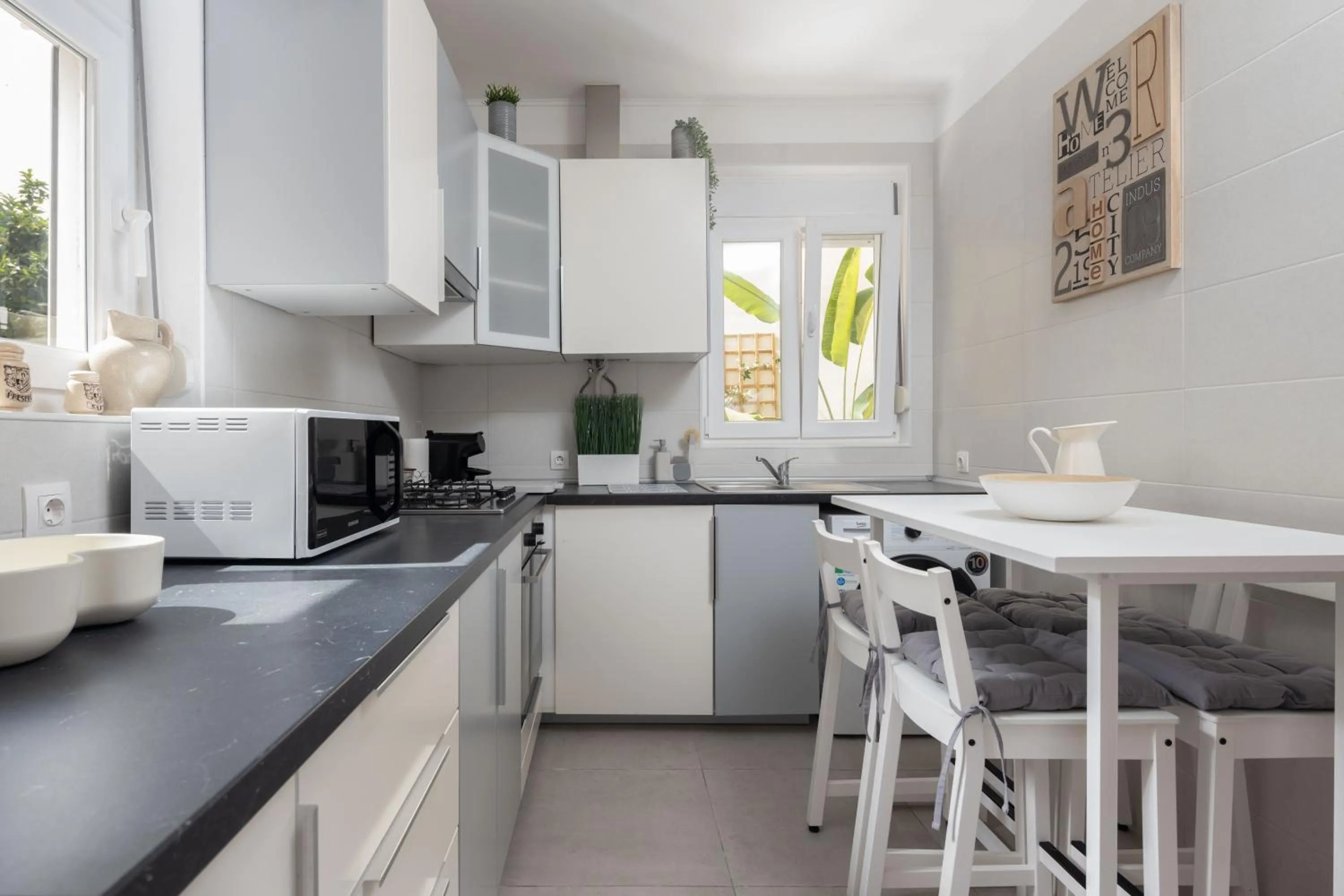 Kitchen or kitchenette in Serene 2BDR Apartment W/ Patio by LovelyStay