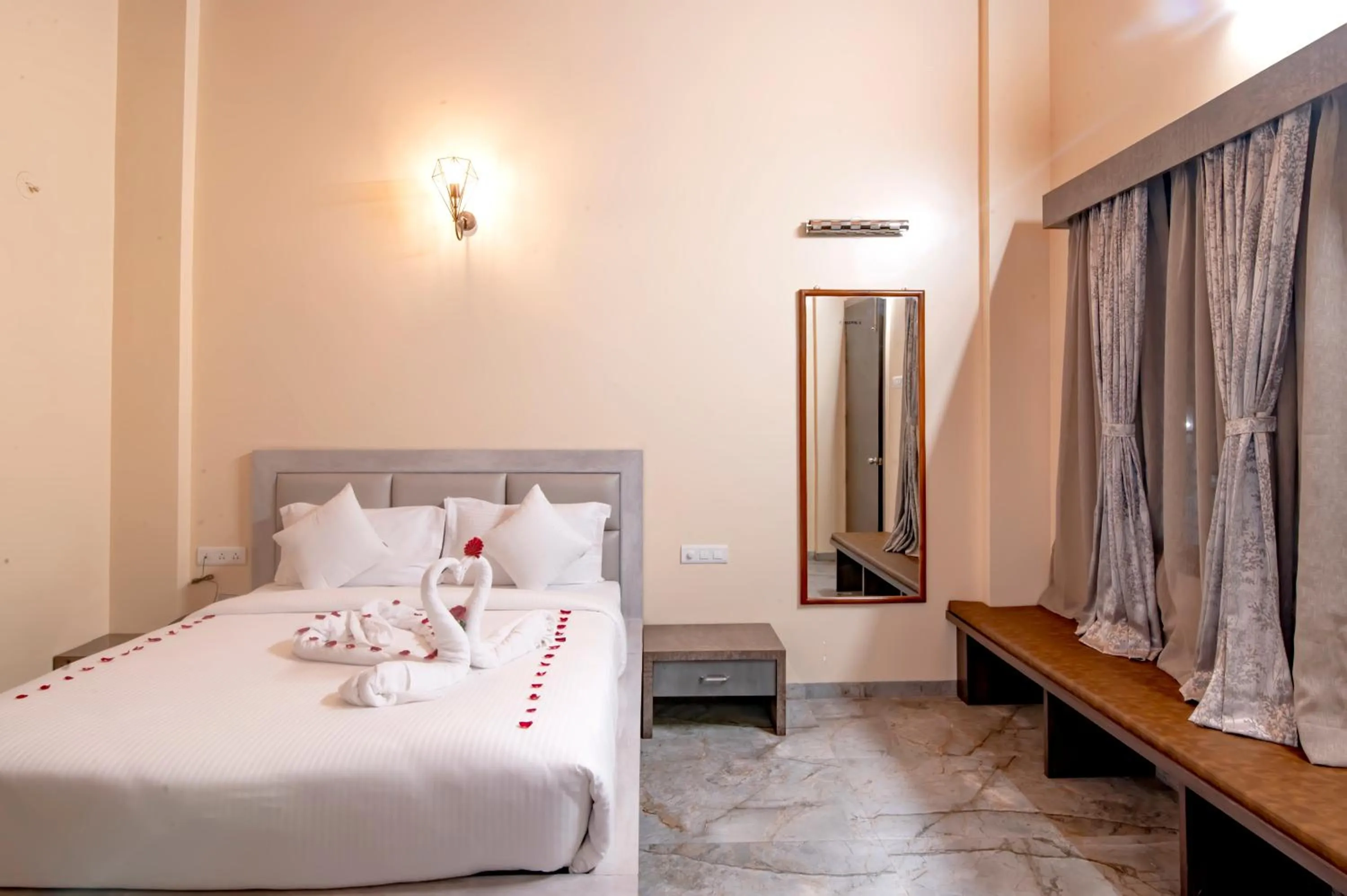 Bed in Freesia Resort by Express Inn