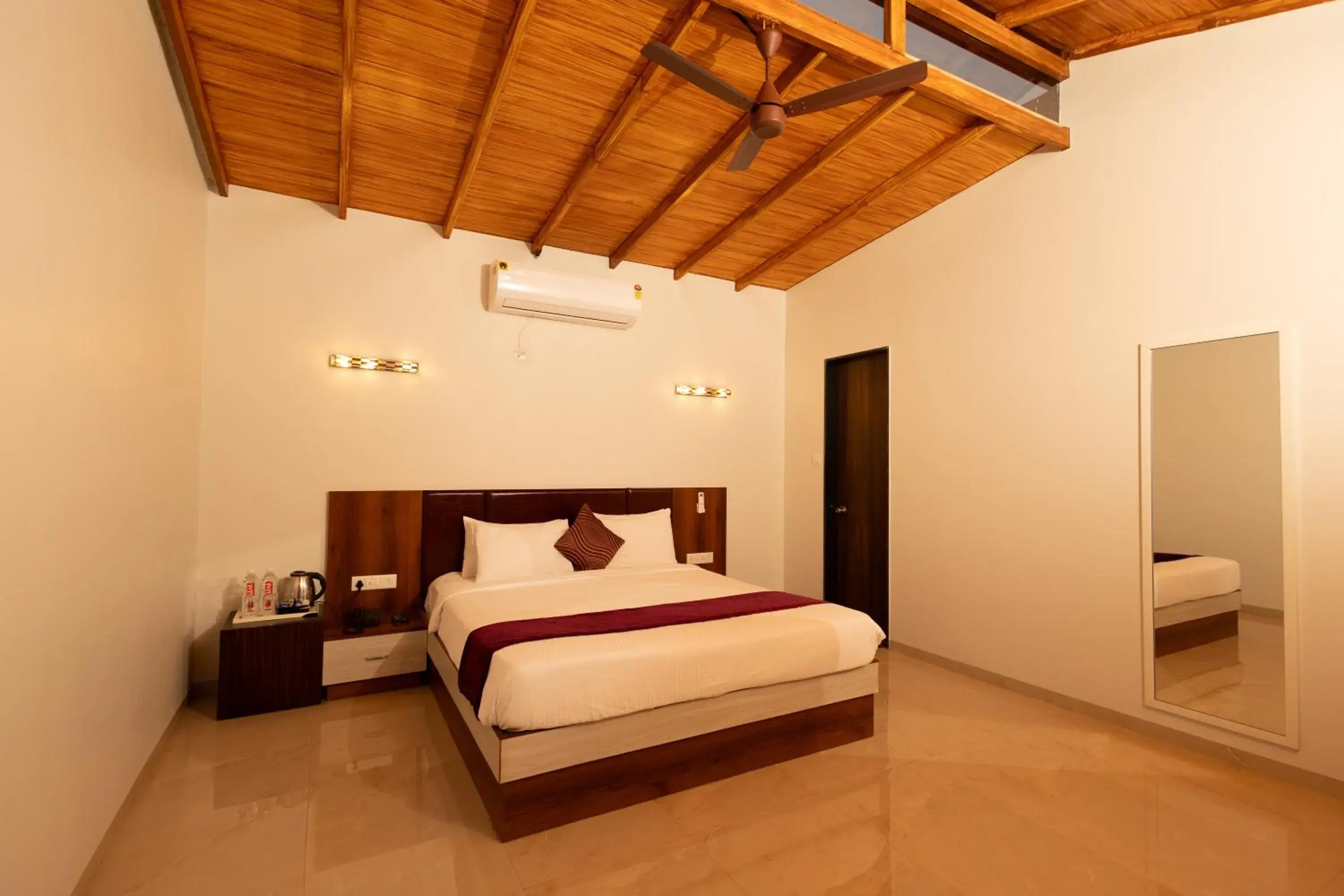 Bed in Freesia Resort by Express Inn Bed in Freesia Resort by Express Inn