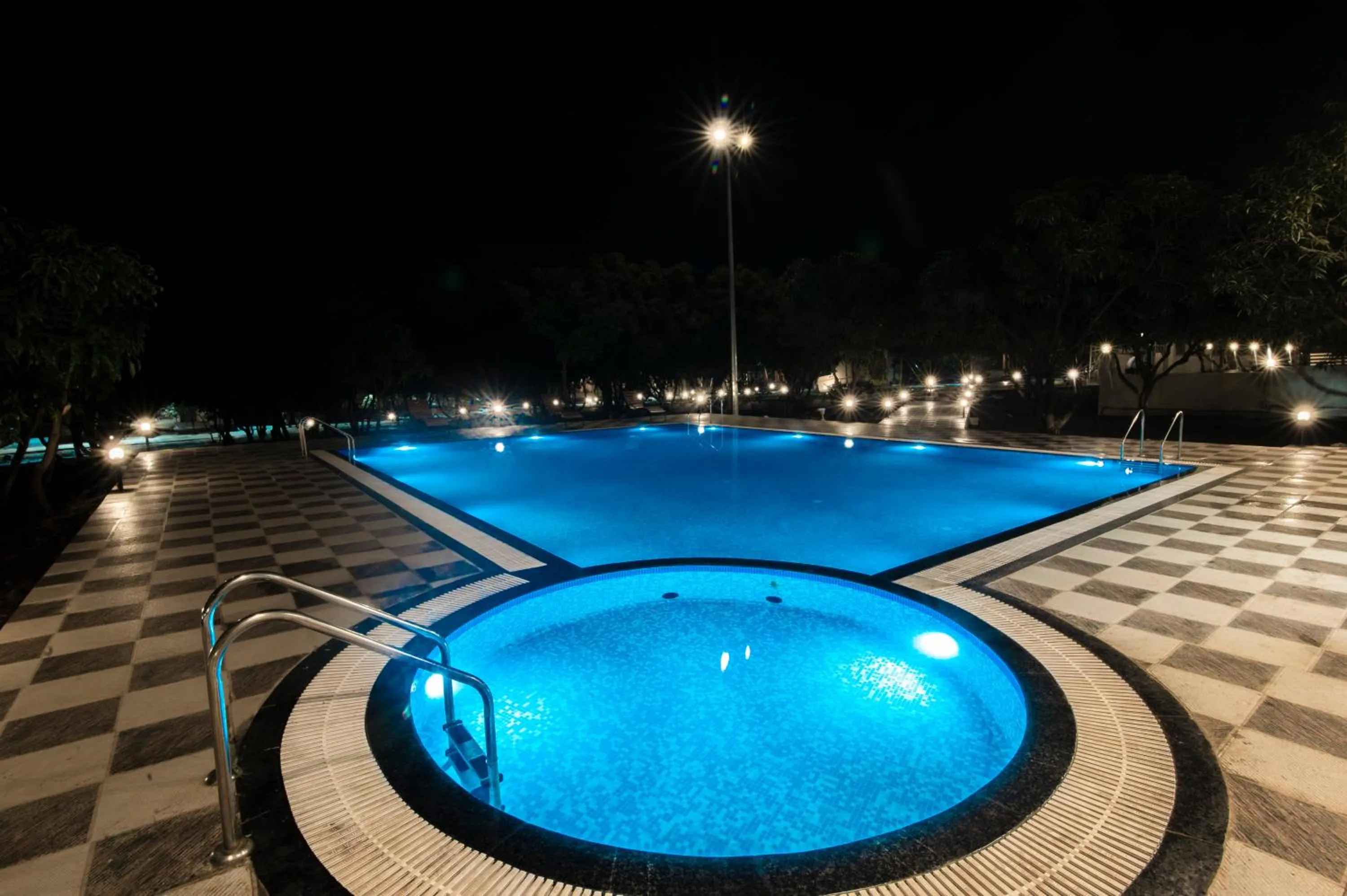 Swimming pool in Freesia Resort by Express Inn