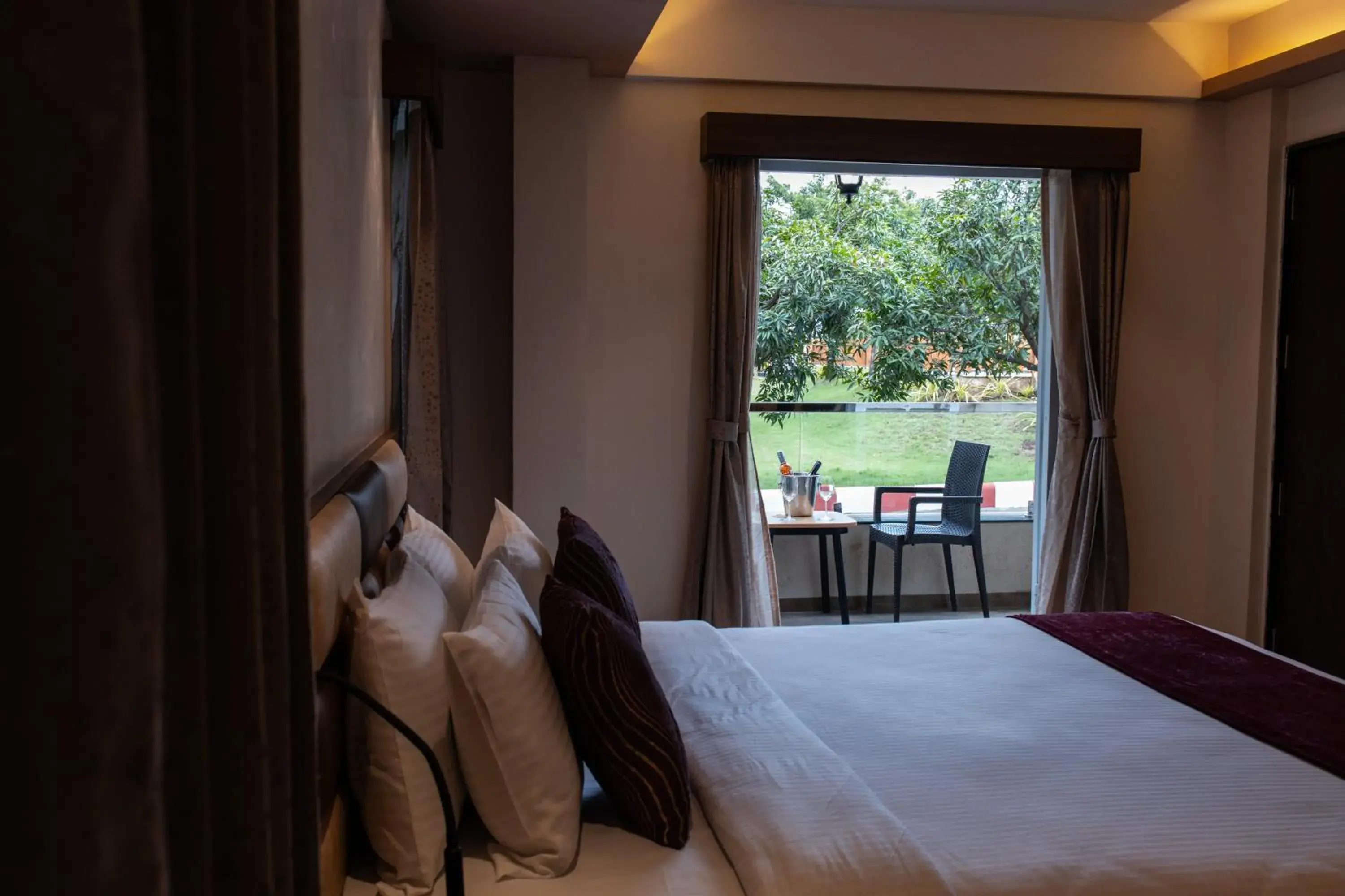 Garden view, Bed in Freesia Resort by Express Inn Garden view, Bed in Freesia Resort by Express Inn