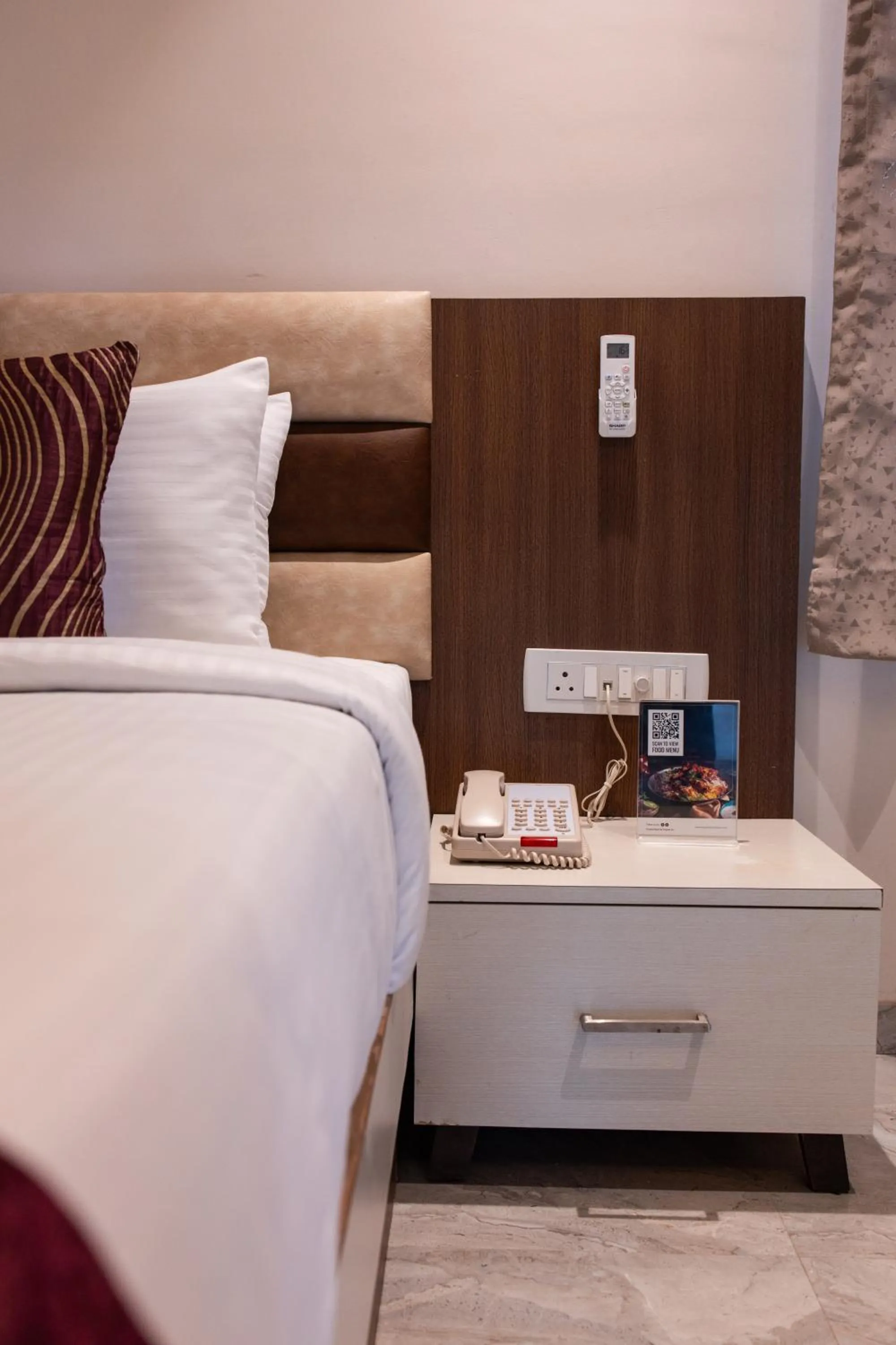 Bed in Freesia Resort by Express Inn