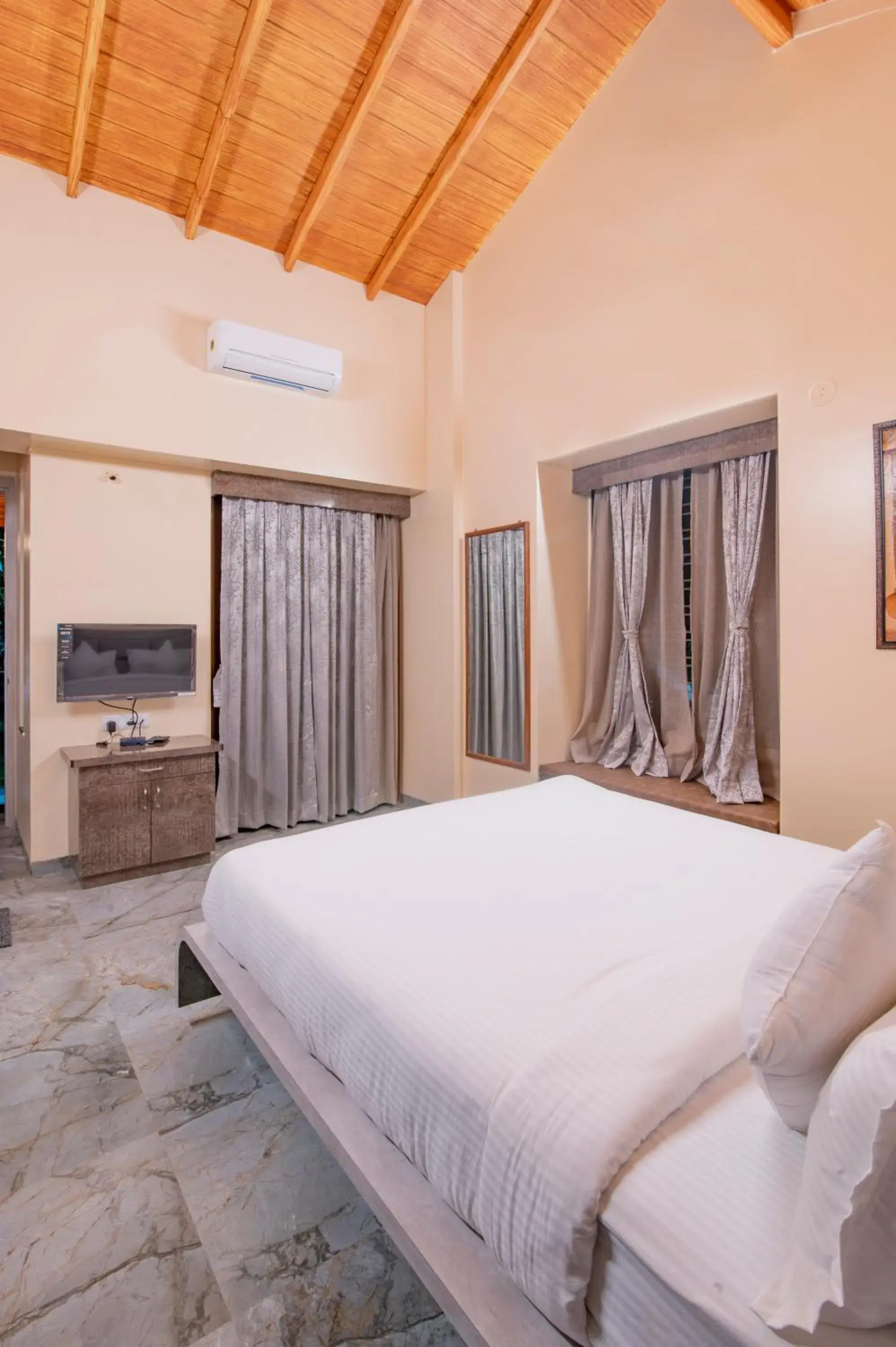 Bed in Freesia Resort by Express Inn Bed in Freesia Resort by Express Inn