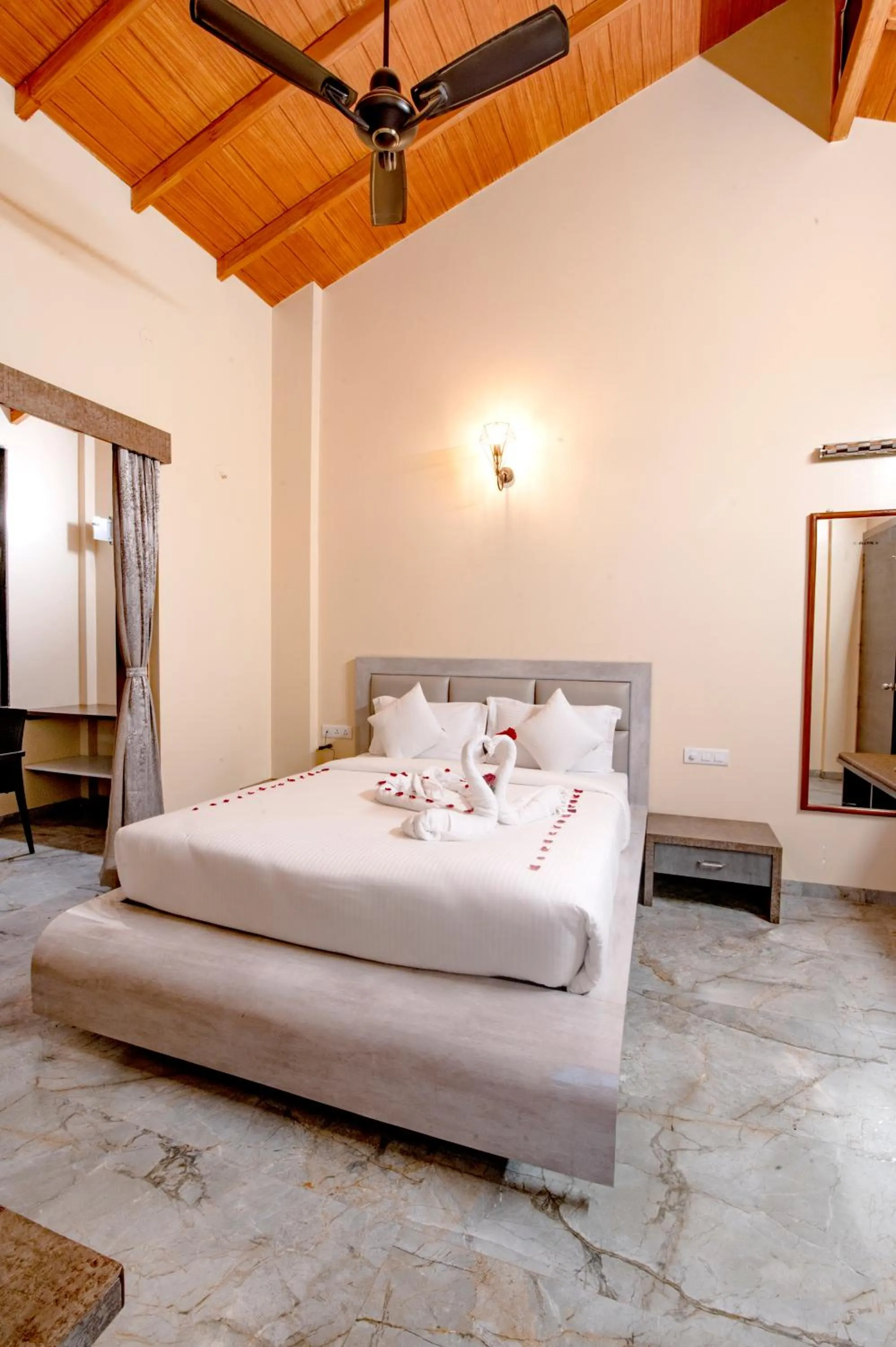 Bed in Freesia Resort by Express Inn