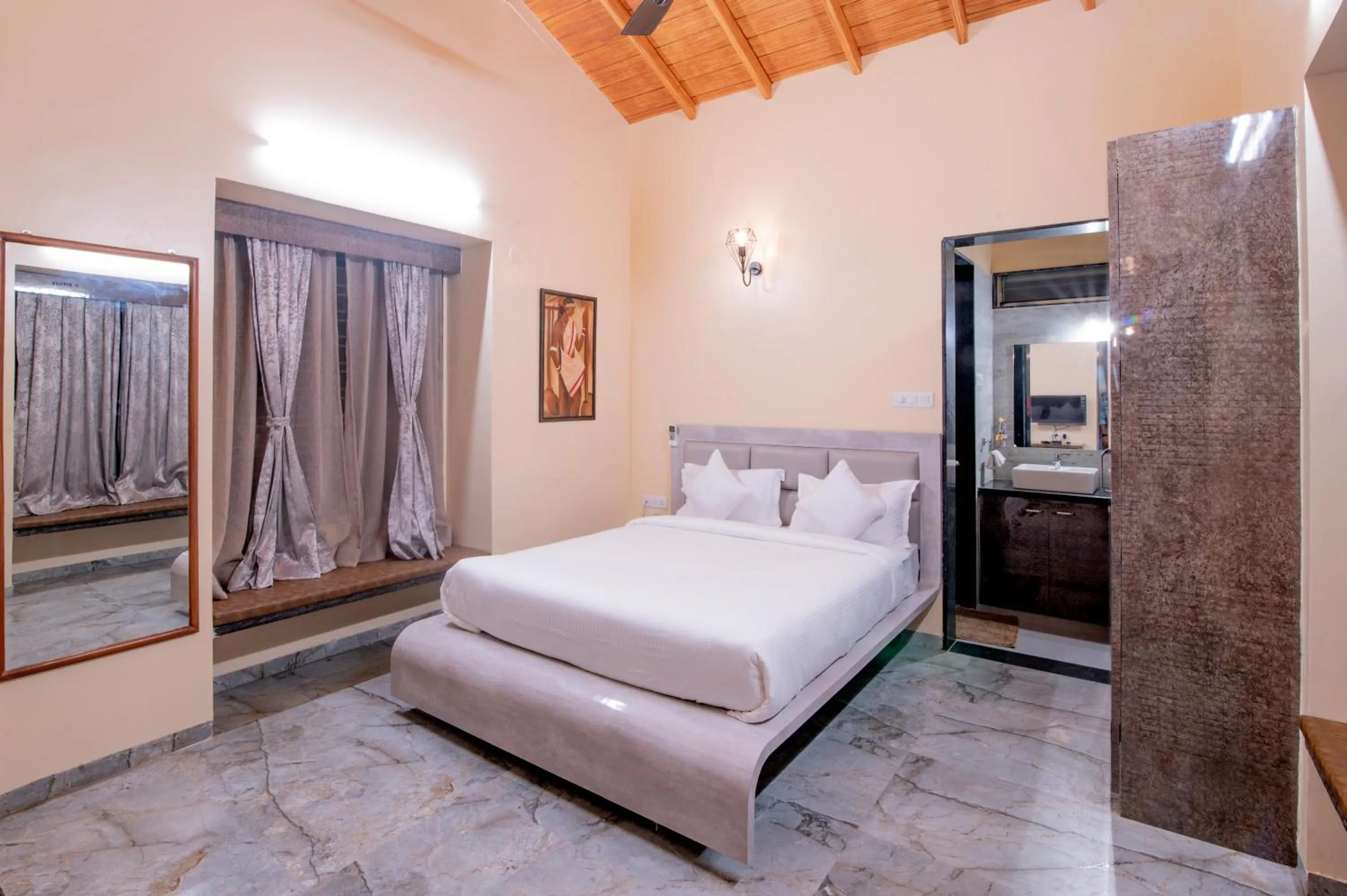 Bed in Freesia Resort by Express Inn