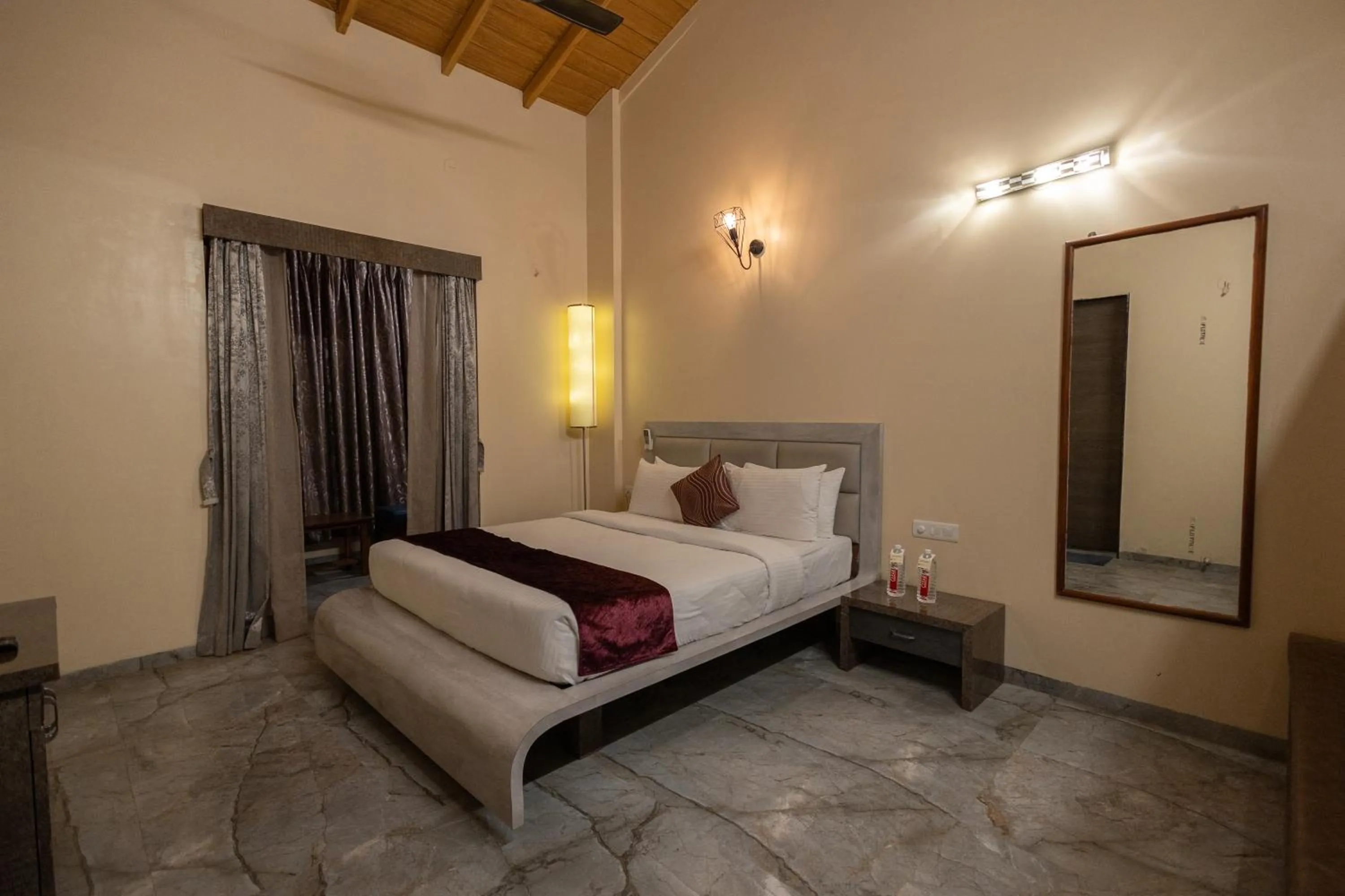 Bed in Freesia Resort by Express Inn