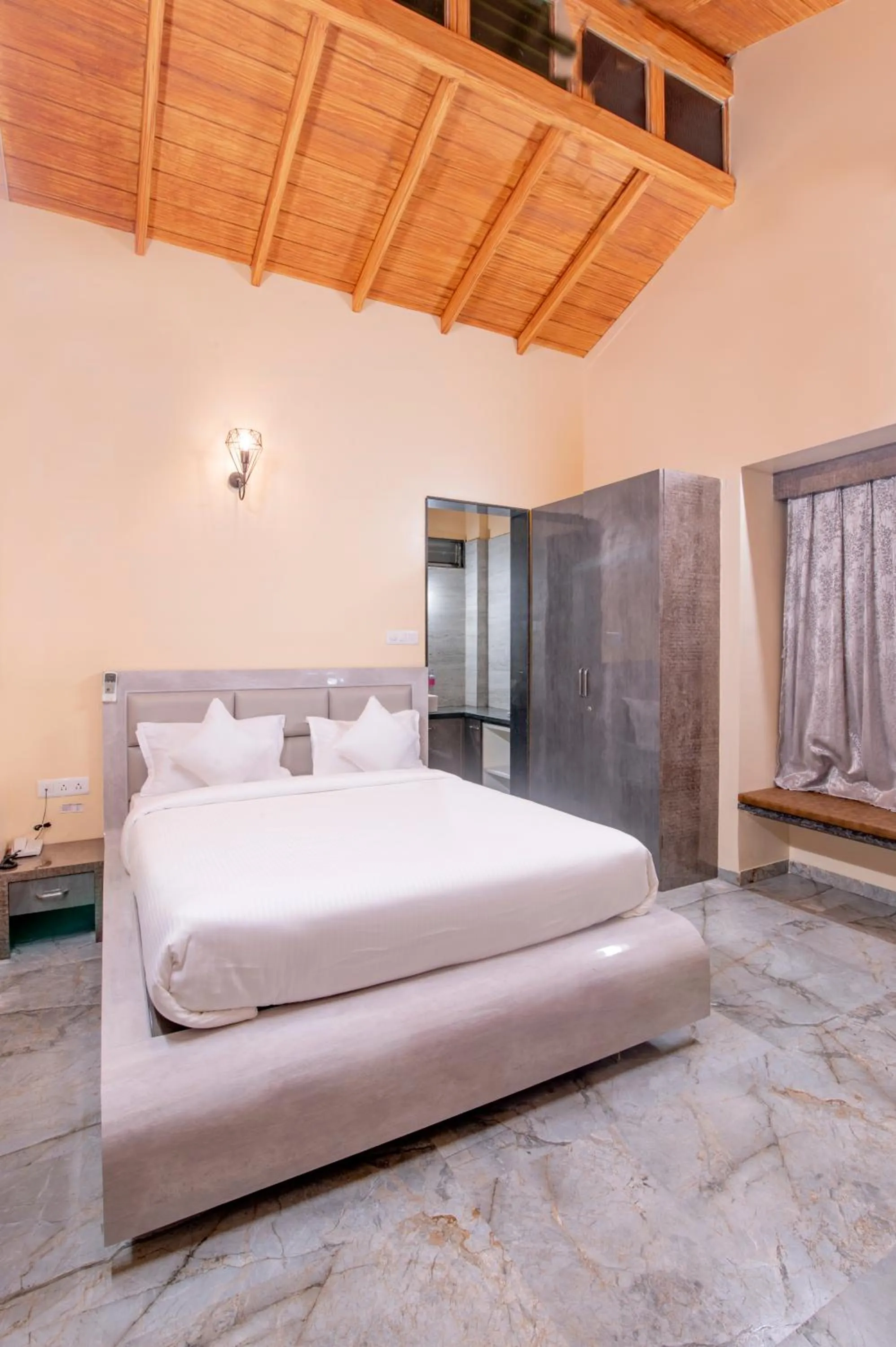 Bed in Freesia Resort by Express Inn