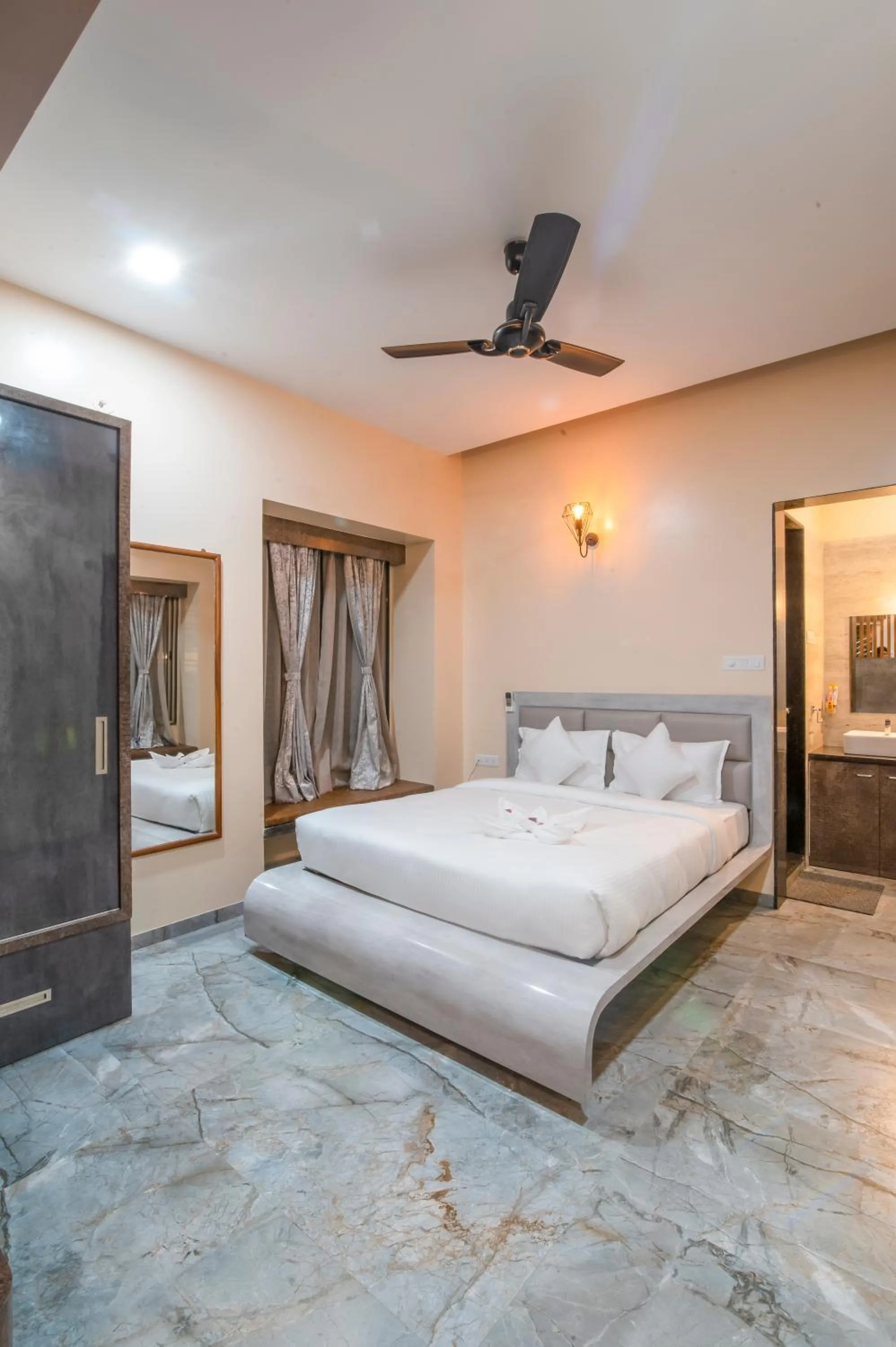 Bed in Freesia Resort by Express Inn