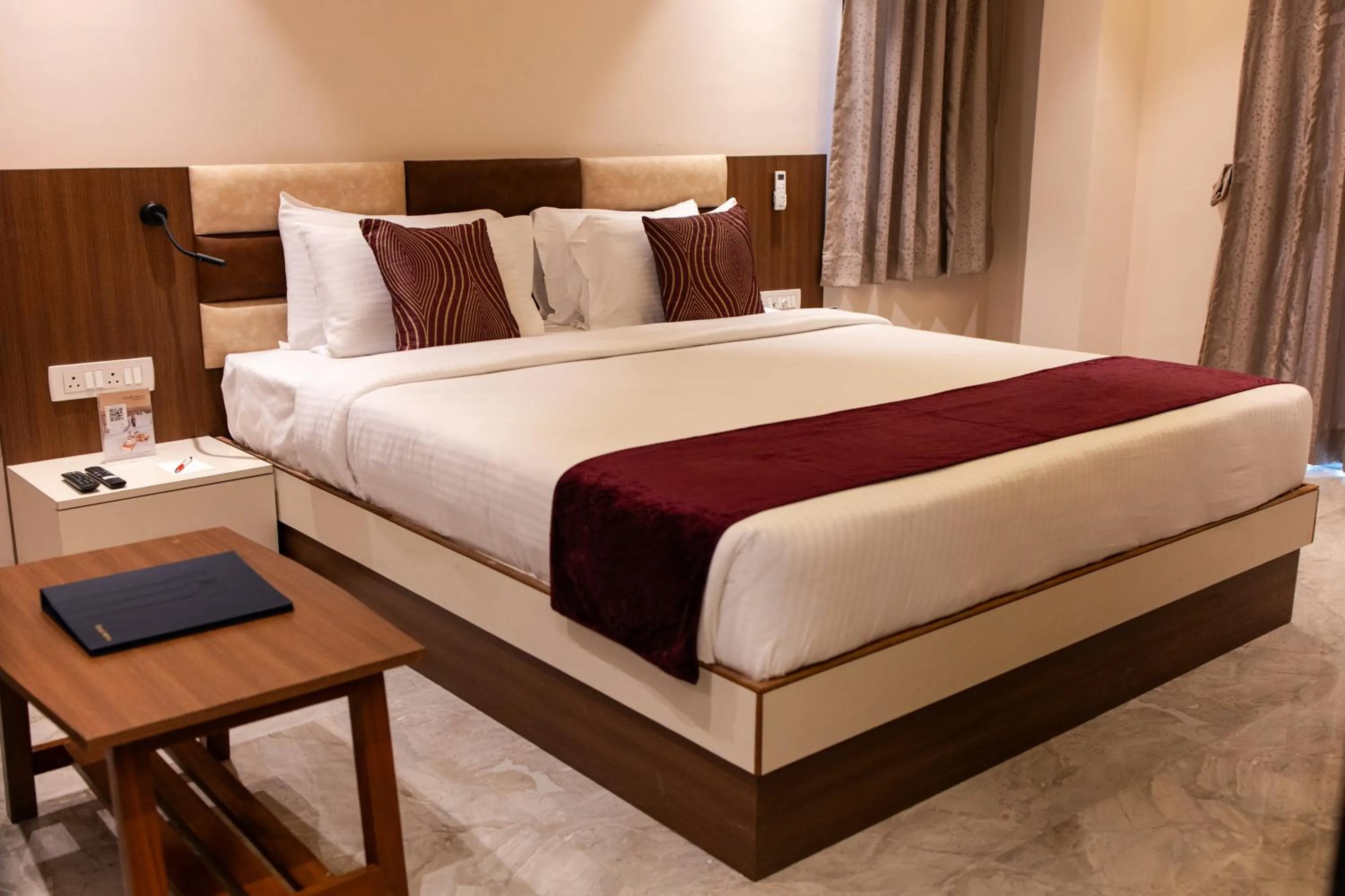 Bed in Freesia Resort by Express Inn
