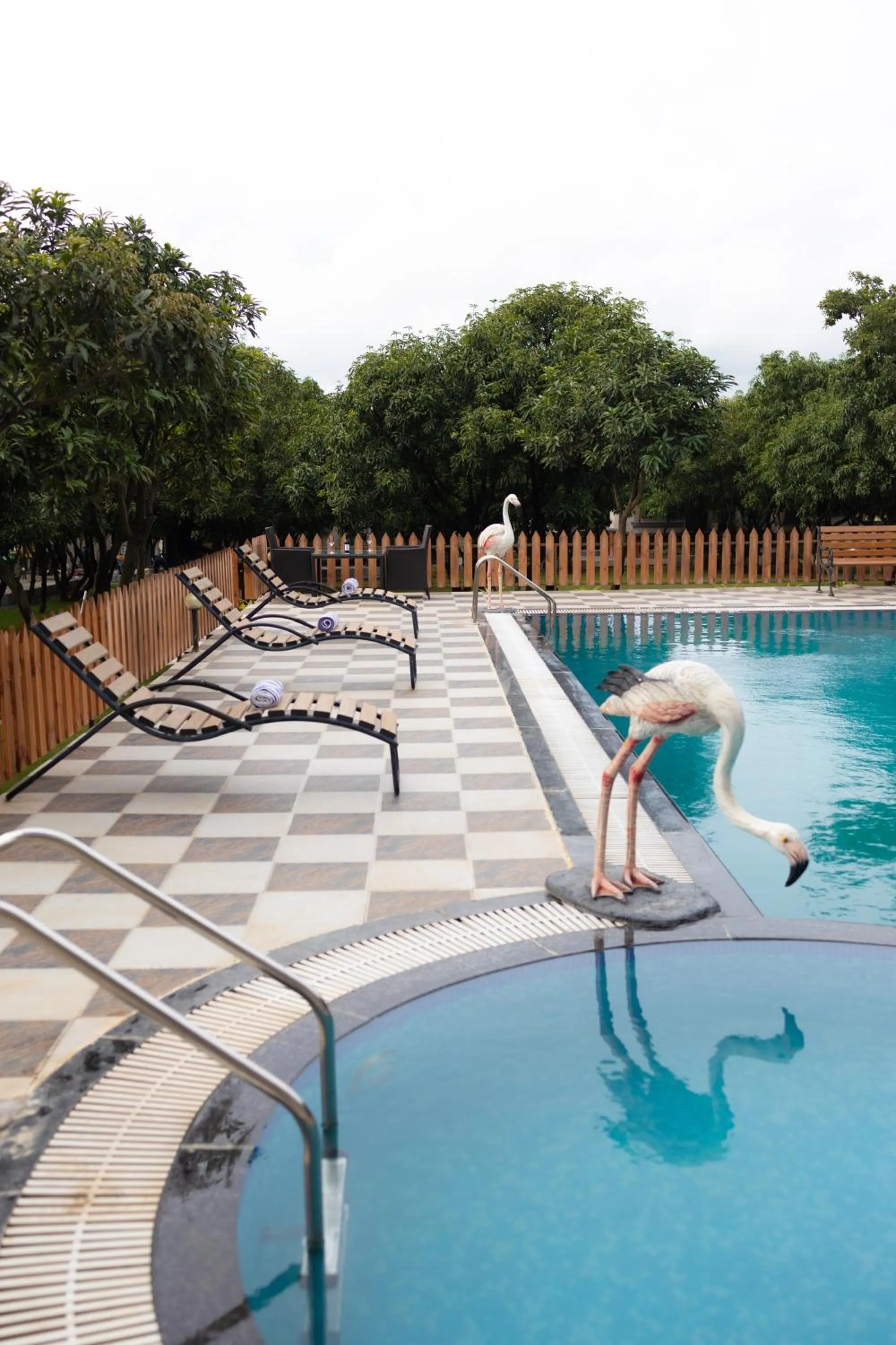 Swimming pool in Freesia Resort by Express Inn