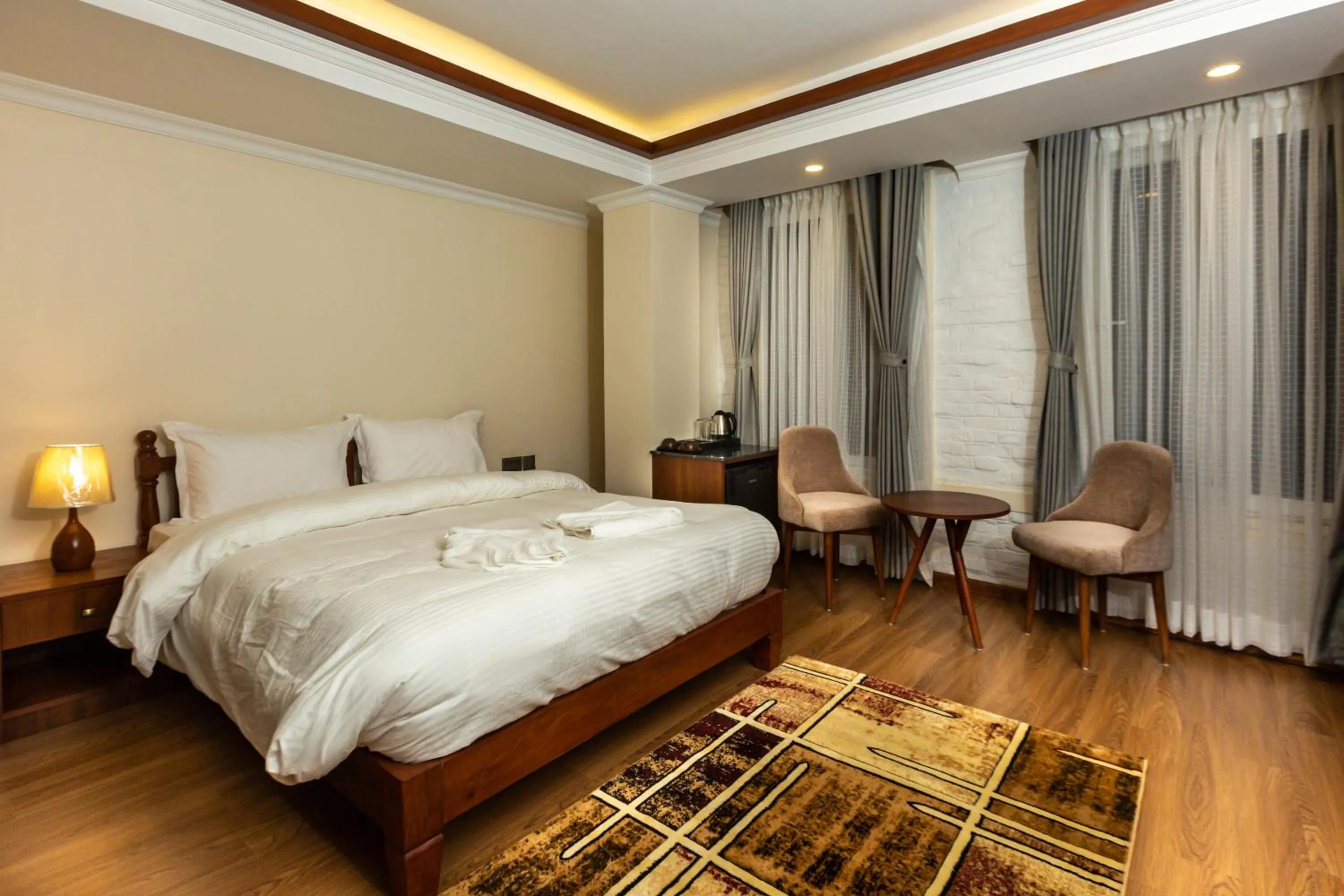 Bed in Darbar Heritage Inn