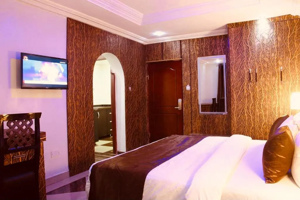 Bed in E-Suites Hotel, Abuja