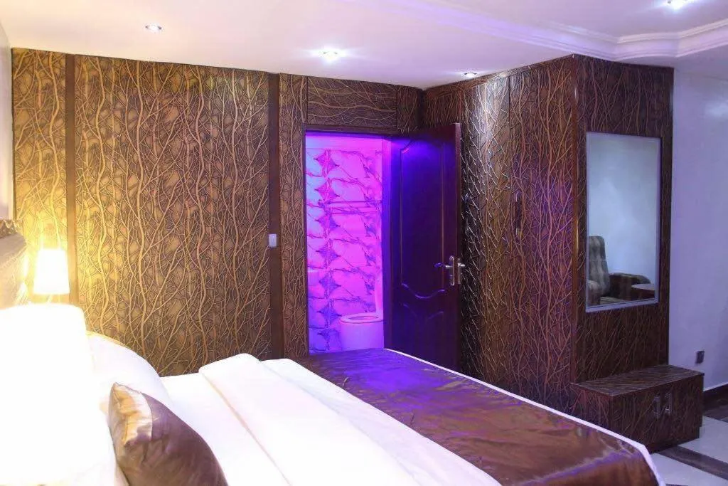 Bed in E-Suites Hotel, Abuja