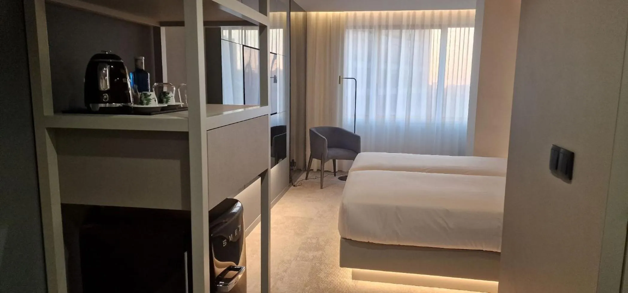 Bed in Bom Sucesso Hotel by gaiarooms