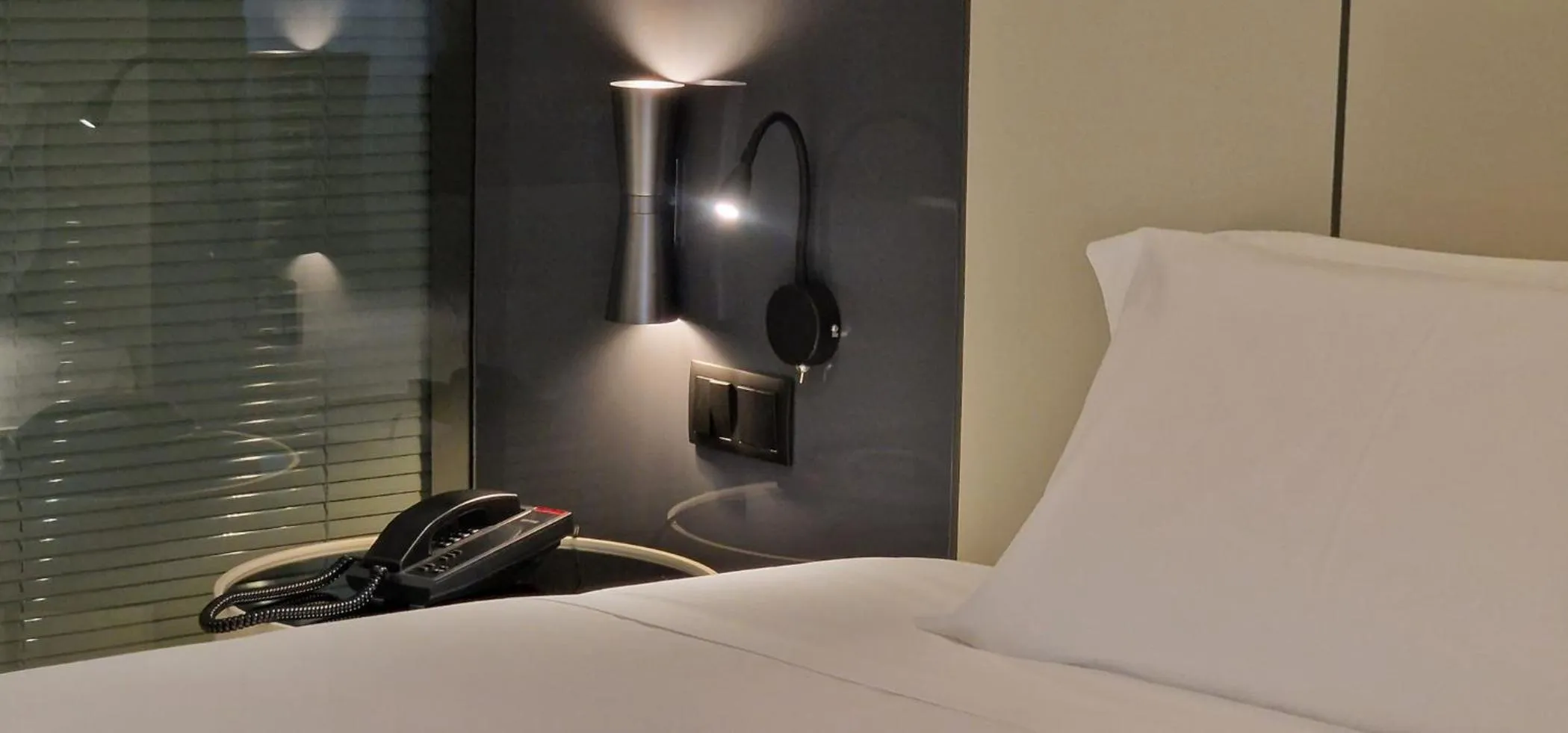 Bed in Bom Sucesso Hotel by gaiarooms