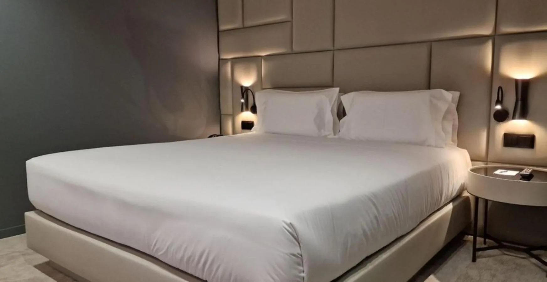 Bed in Bom Sucesso Hotel by gaiarooms