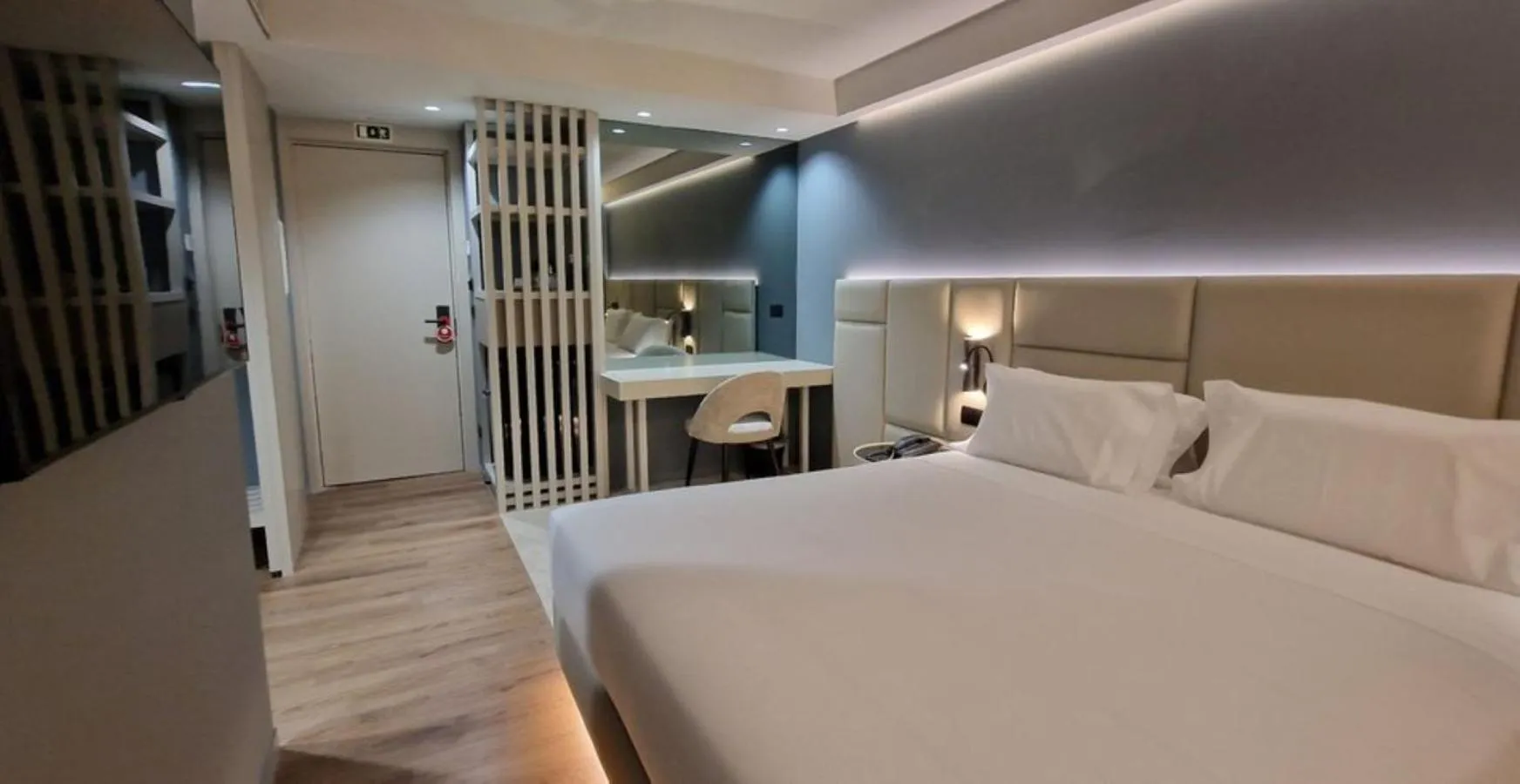 Bed in Bom Sucesso Hotel by gaiarooms