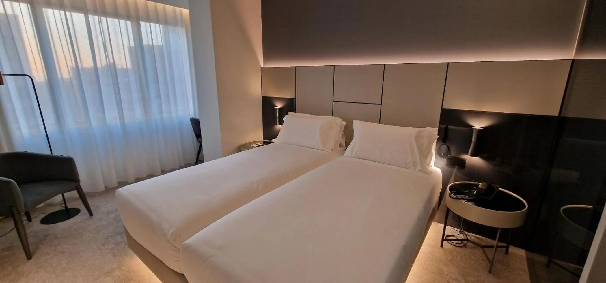 Bed in Bom Sucesso Hotel by gaiarooms