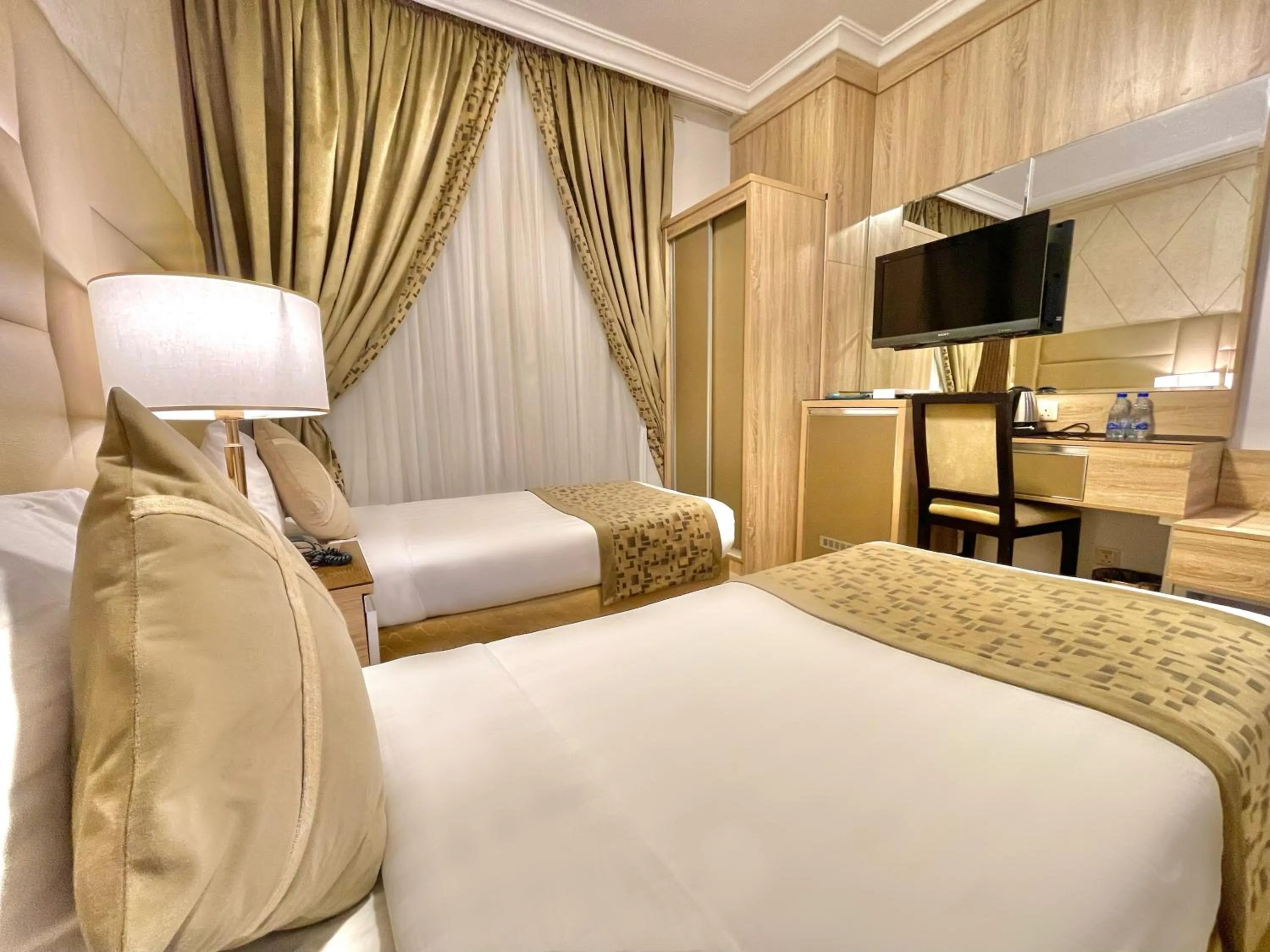 View (from property/room), Bed in شركة المختارة العالمي للخدمات الفندقيه - Al Mukhtara International Hotel