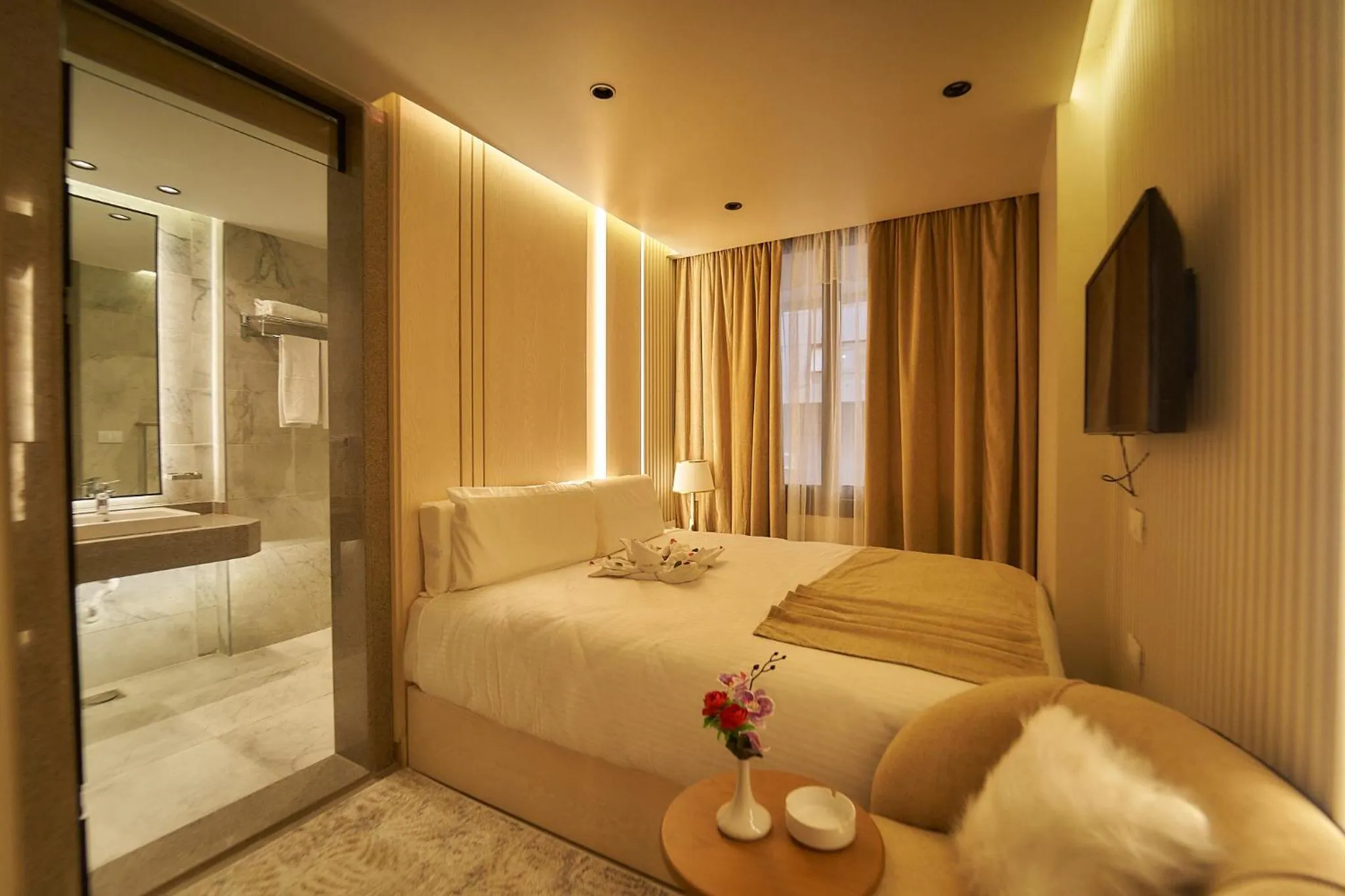 Bed in Gold's Pyramids Hotel