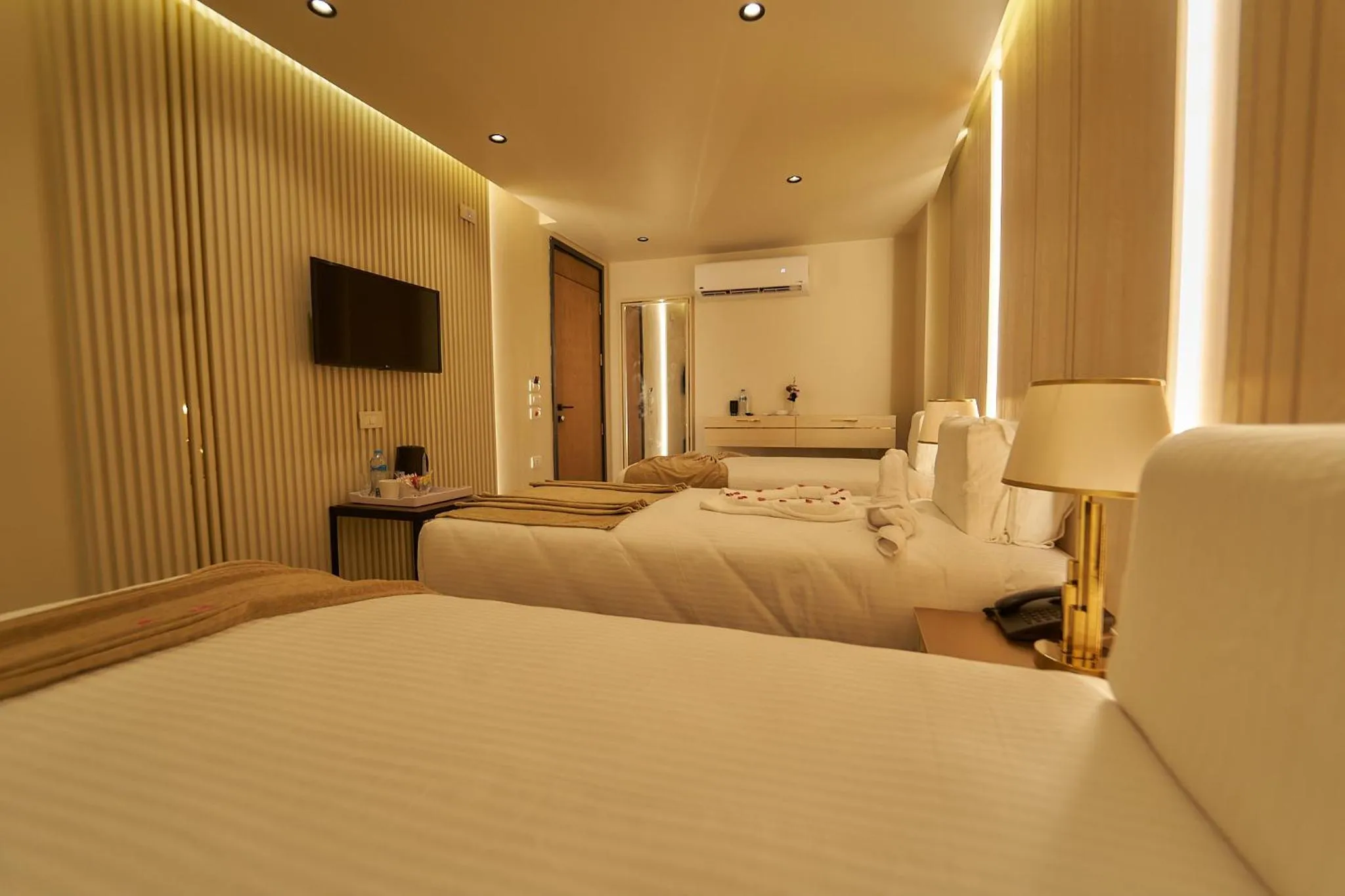 Bed in Gold's Pyramids Hotel