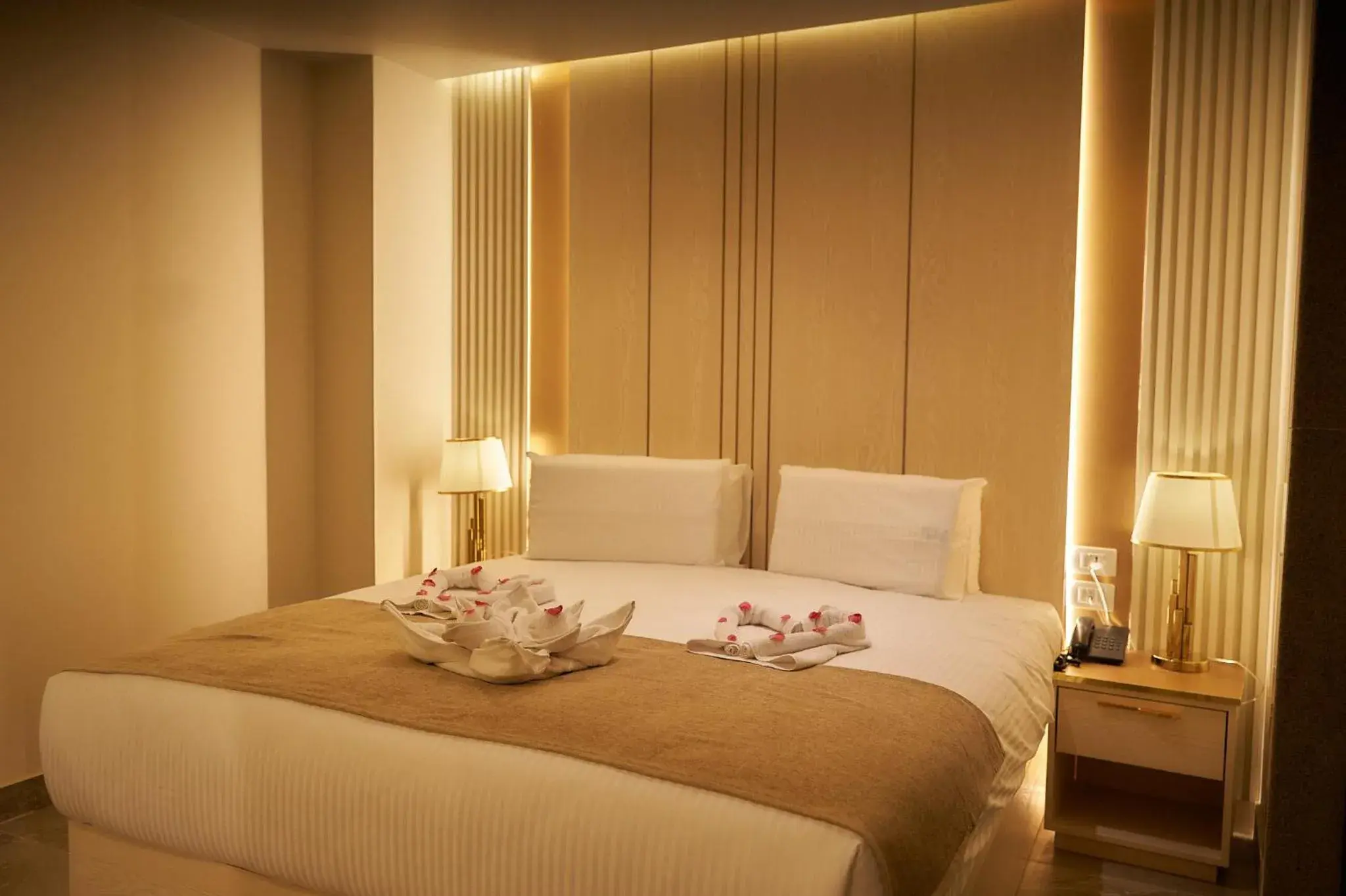 Bed in Gold's Pyramids Hotel Bed in Gold's Pyramids Hotel