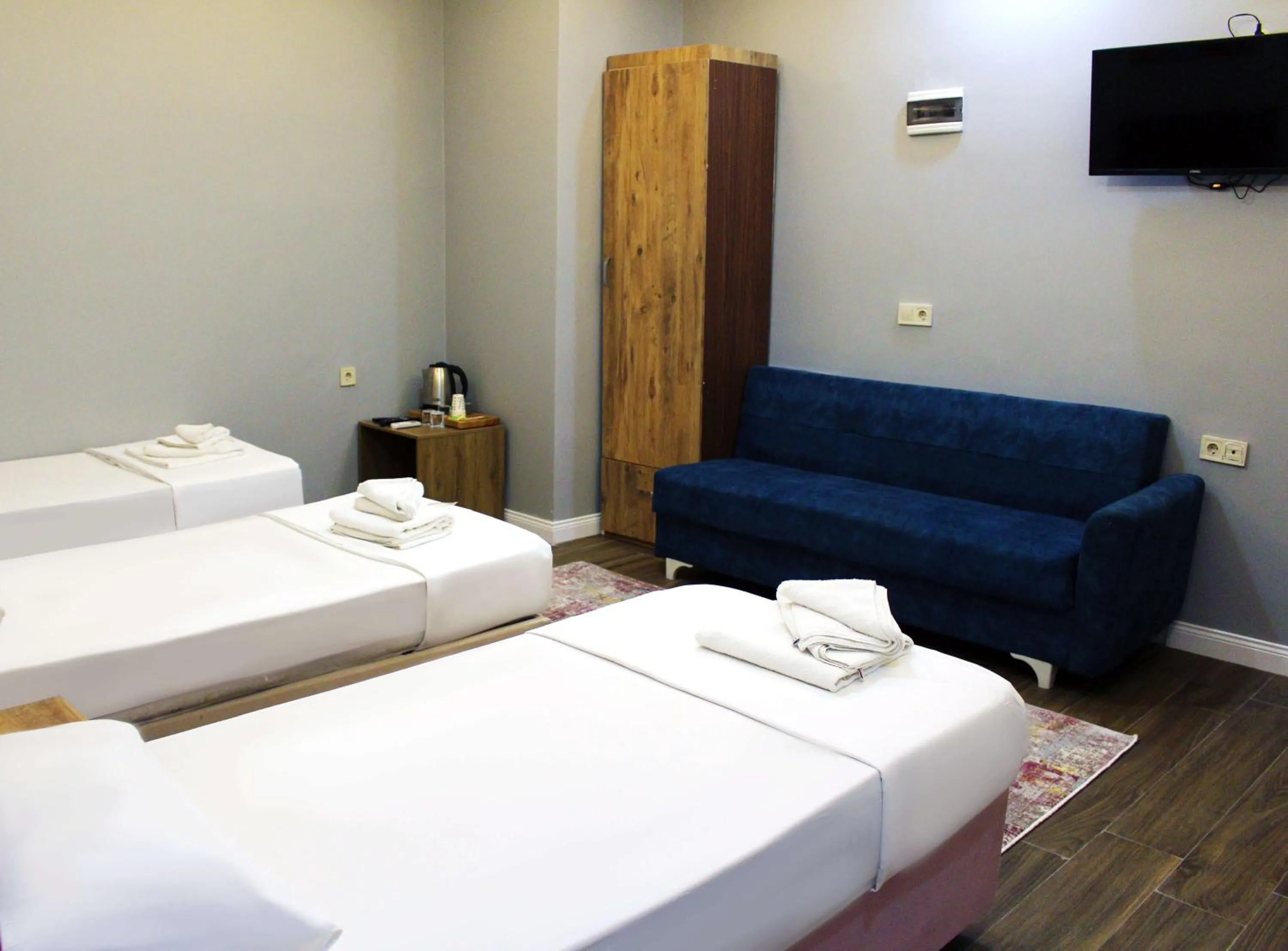 Communal lounge/ TV room, Bed in Avist Hotel Avcılar